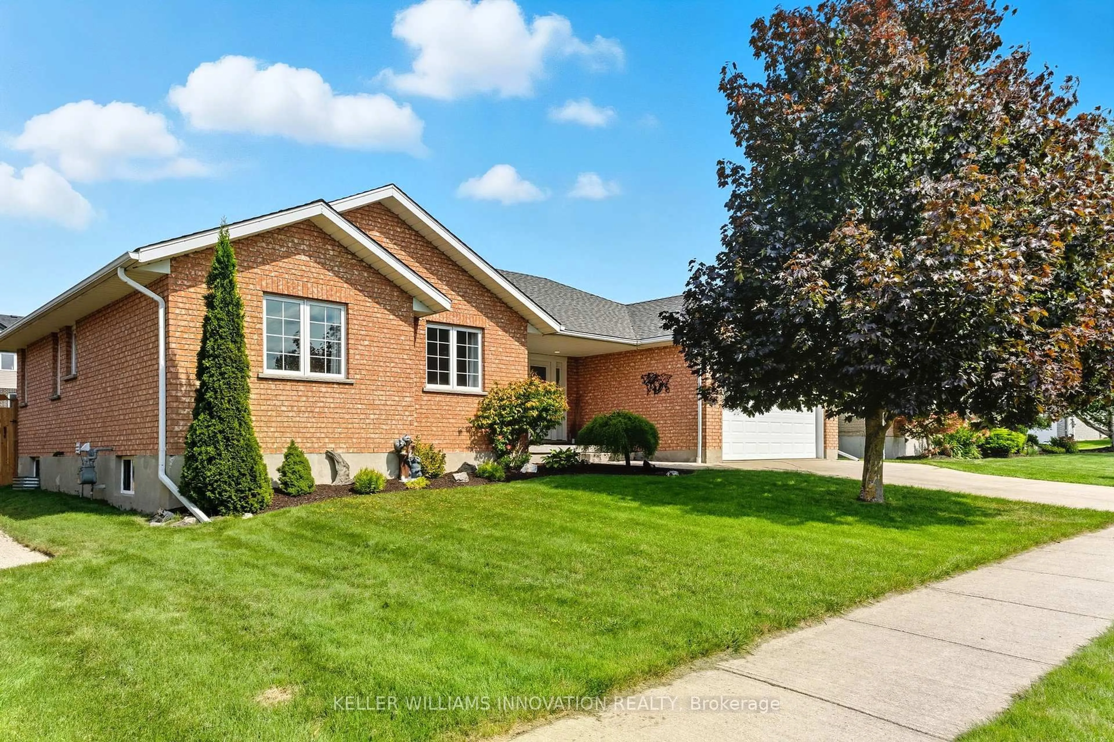 Home with brick exterior material, street for 215 Bamford Dr, North Perth Ontario N4W 3V2