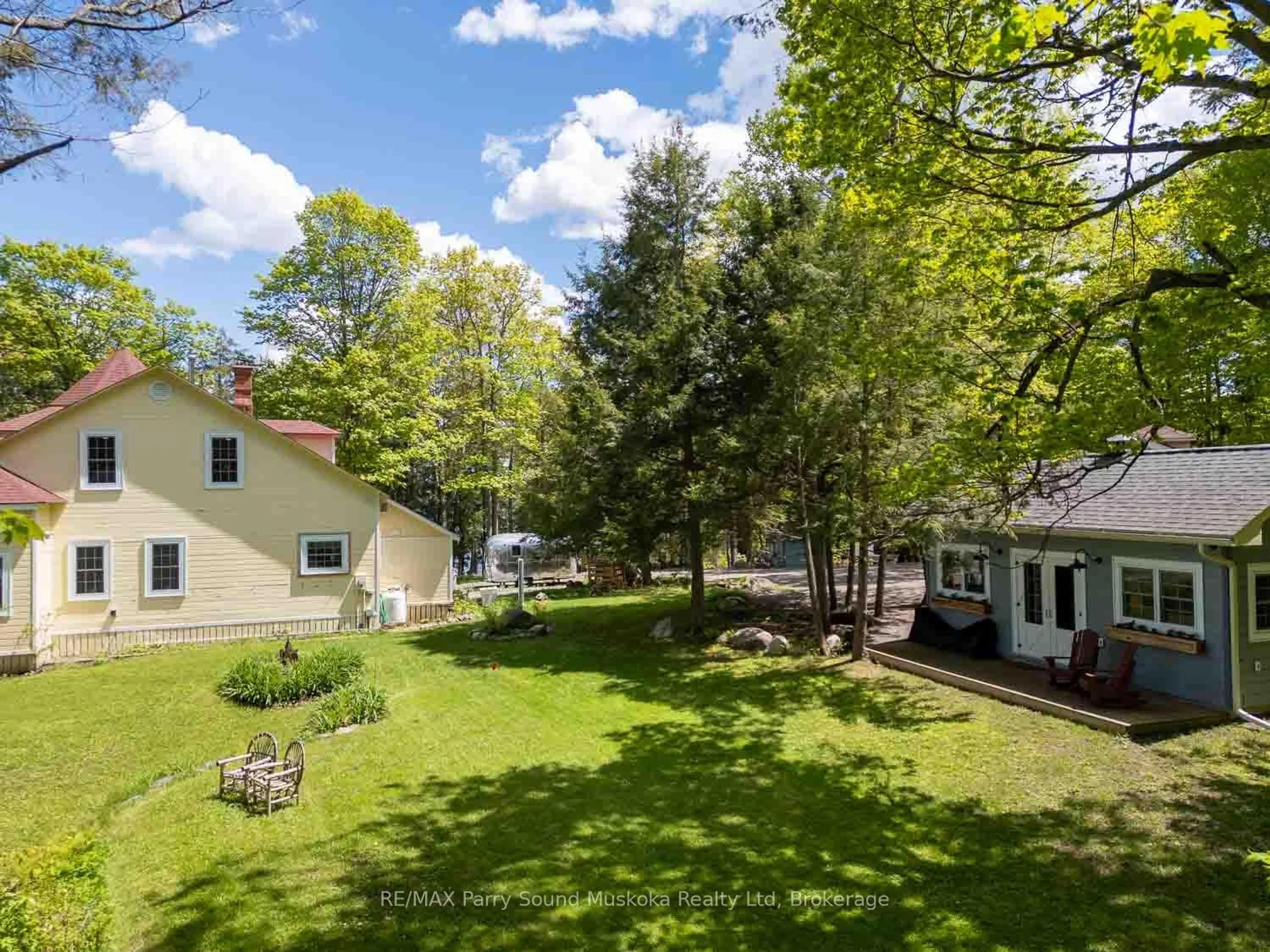 A pic from outside/outdoor area/front of a property/back of a property/a pic from drone, forest/trees view for 108 Starratt Rd, Ryerson Ontario P0A 1C0