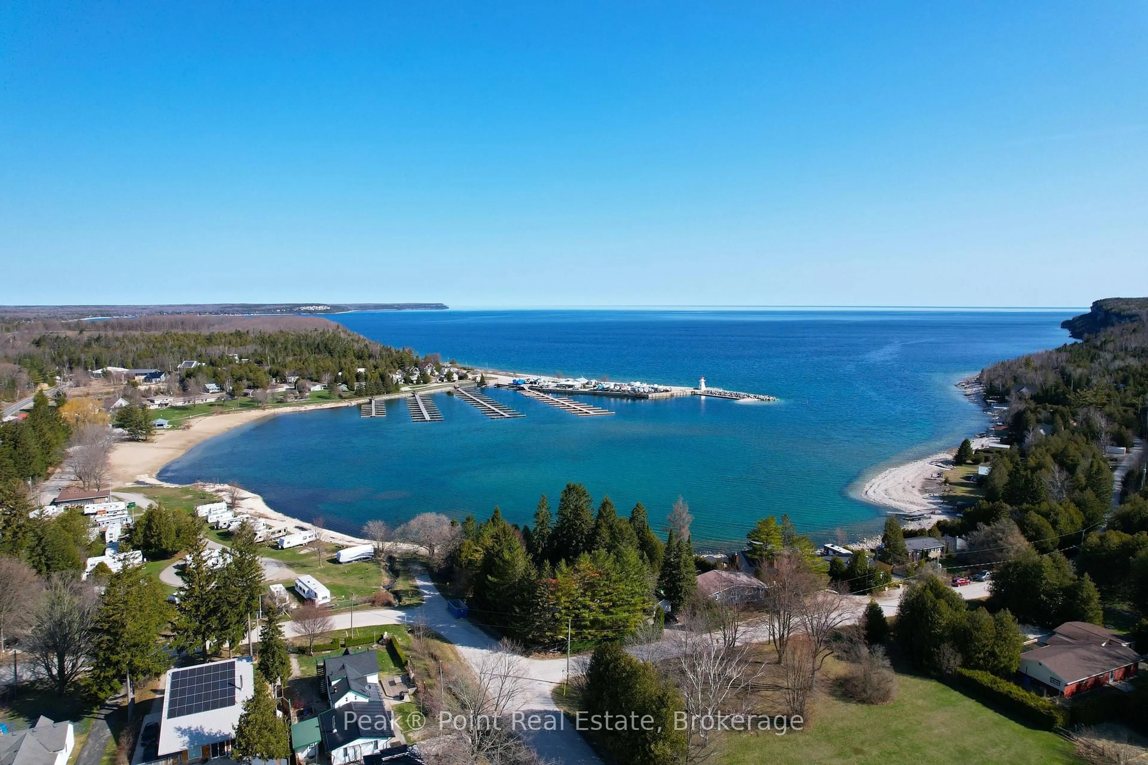 A pic from outside/outdoor area/front of a property/back of a property/a pic from drone, water/lake/river/ocean view for 20 Moore St, Northern Bruce Peninsula Ontario N0H 1W0