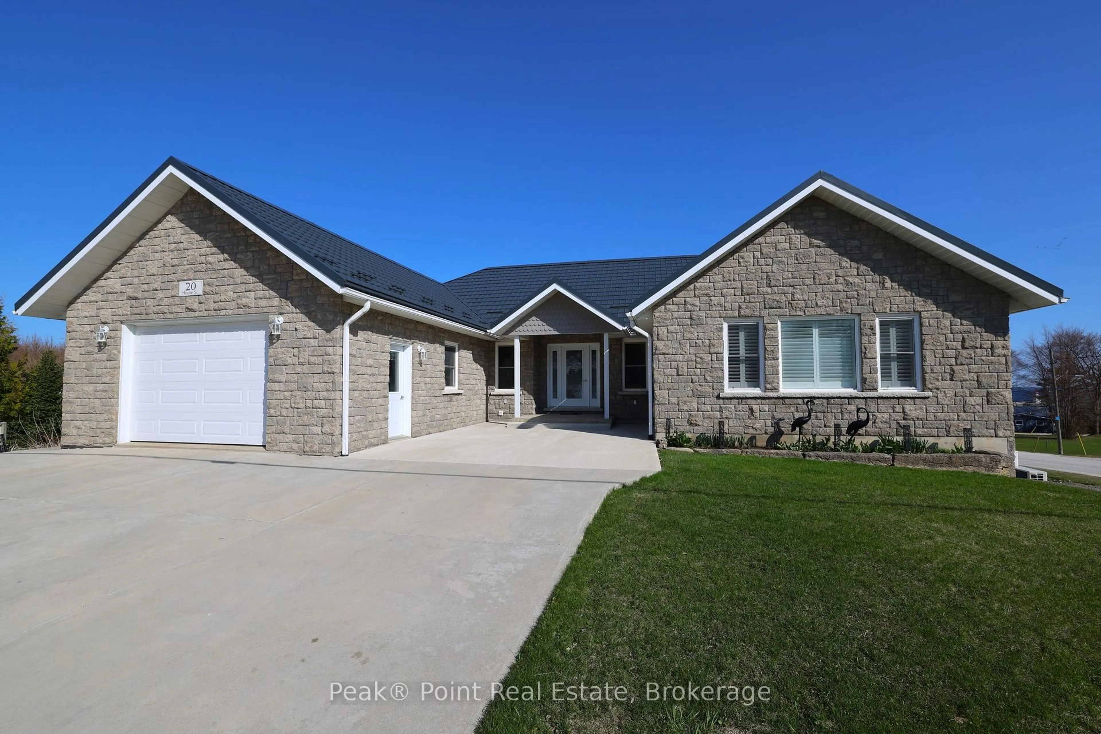 Home with brick exterior material, street for 20 Moore St, Northern Bruce Peninsula Ontario N0H 1W0