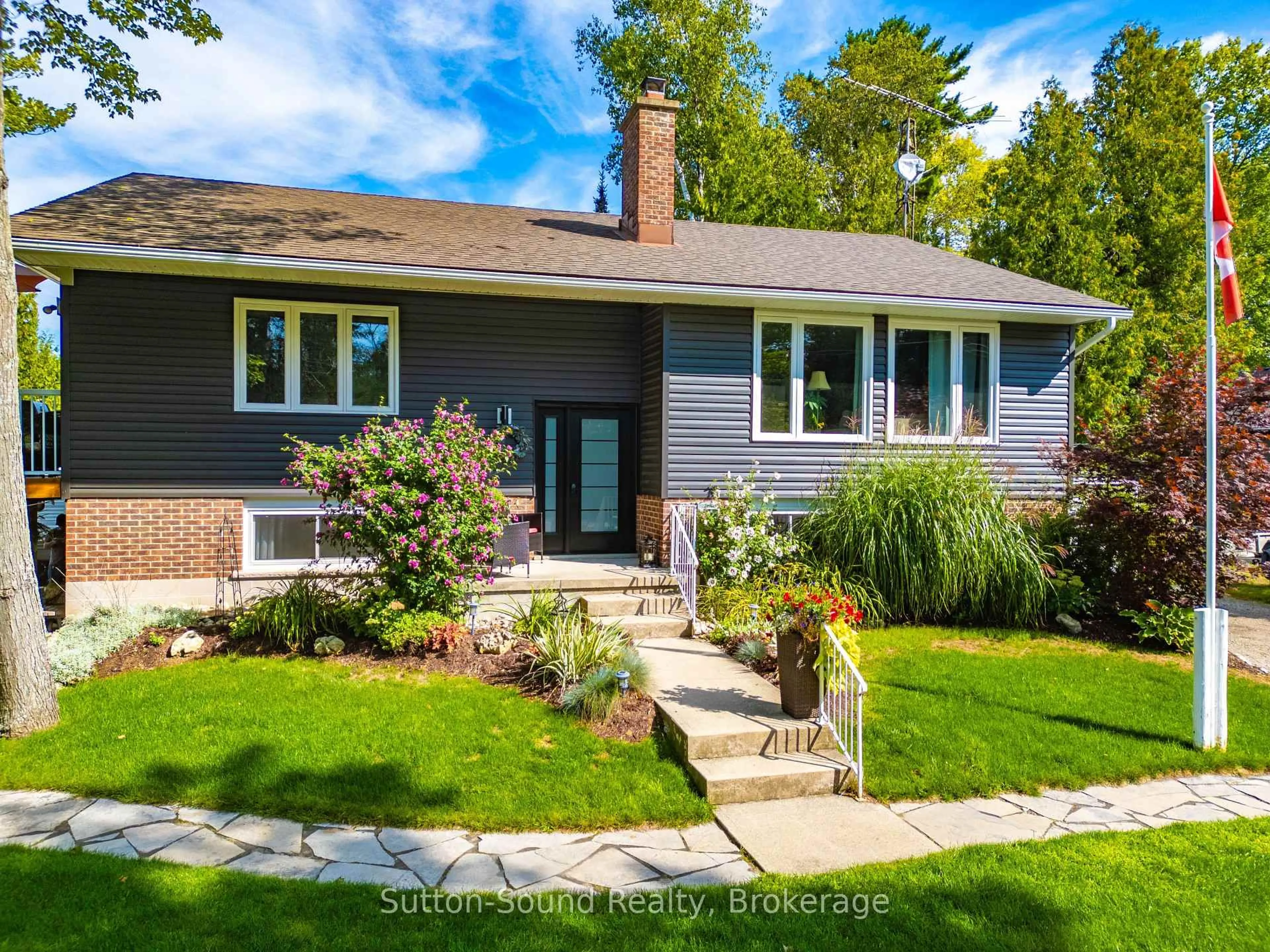 Home with brick exterior material, street for 403 Simcoe Ave, South Bruce Peninsula Ontario N0H 2G0
