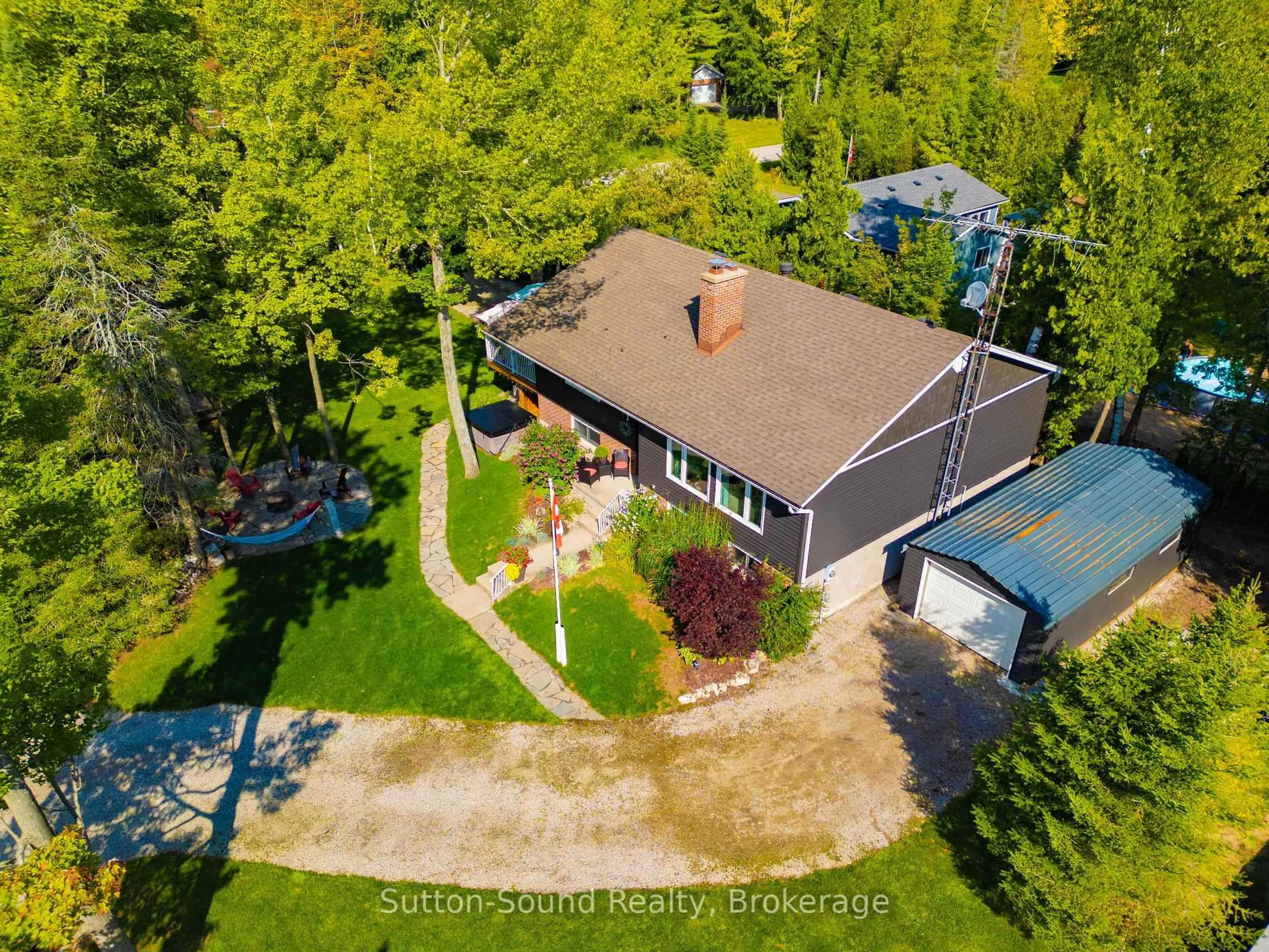 A pic from outside/outdoor area/front of a property/back of a property/a pic from drone, street for 403 Simcoe Ave, South Bruce Peninsula Ontario N0H 2G0