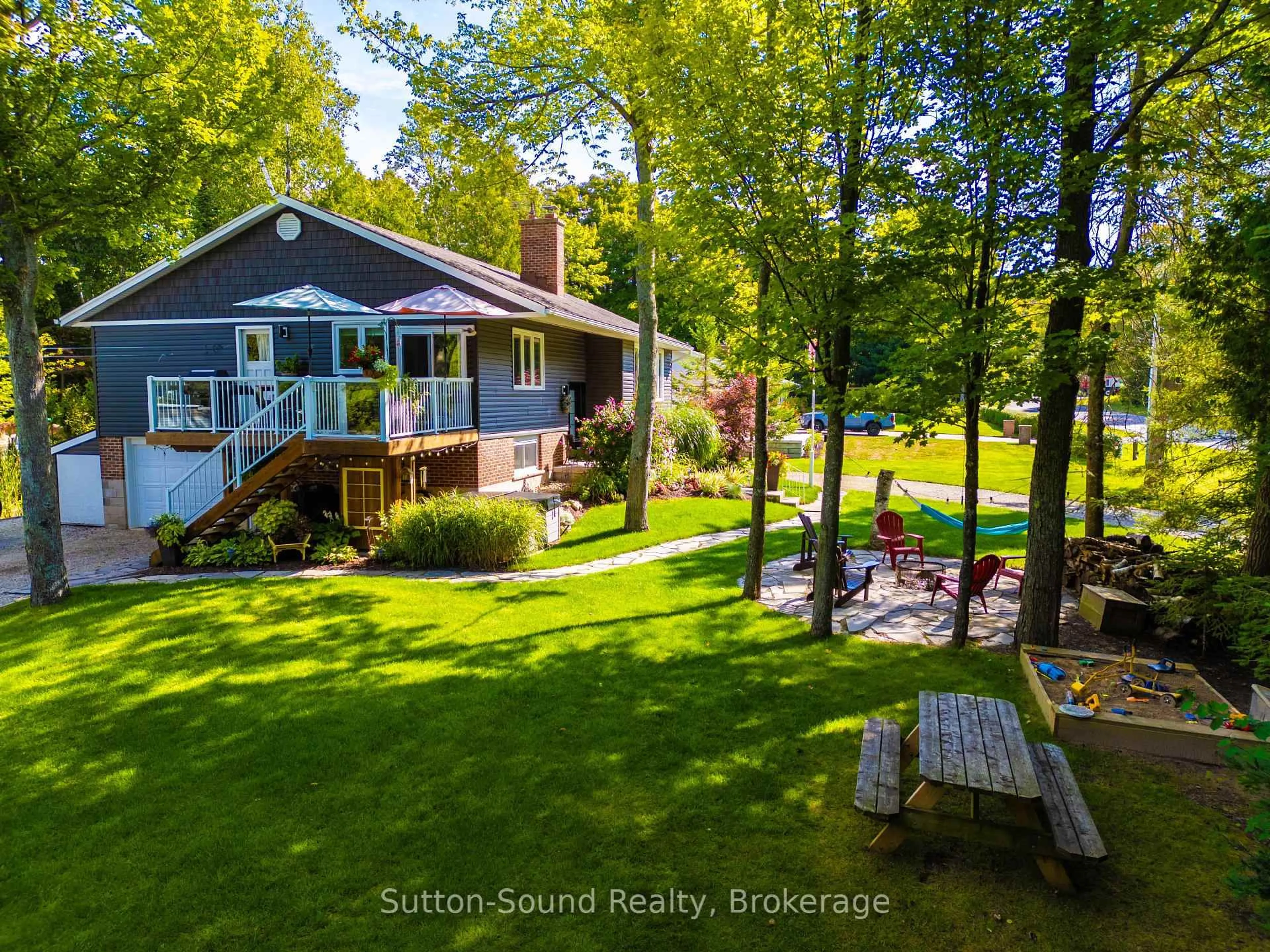 A pic from outside/outdoor area/front of a property/back of a property/a pic from drone, water/lake/river/ocean view for 403 Simcoe Ave, South Bruce Peninsula Ontario N0H 2G0