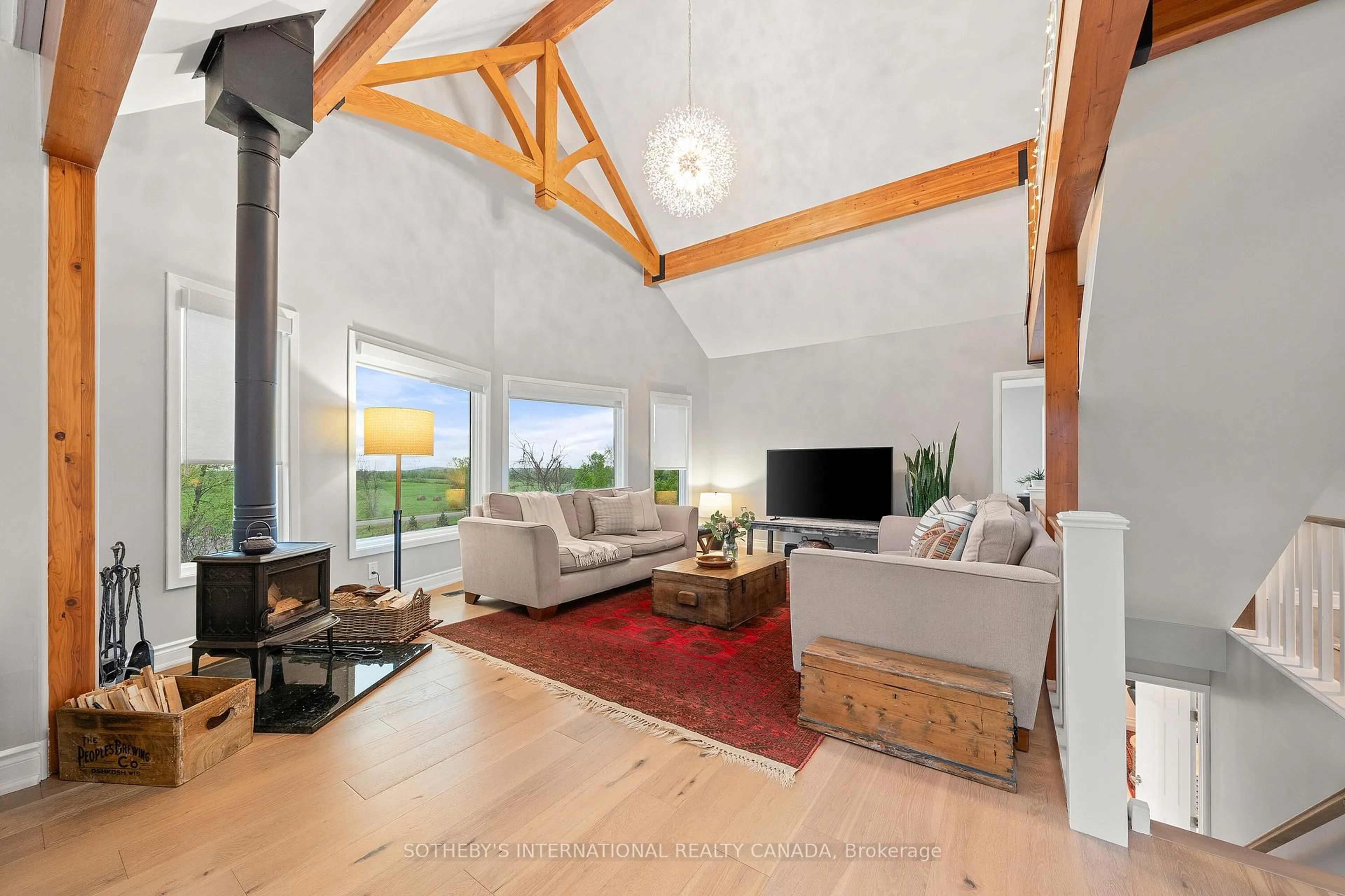 Living room with furniture, wood/laminate floor for 2965 Centre Line Rd, Limoges Ontario K0K 2M0