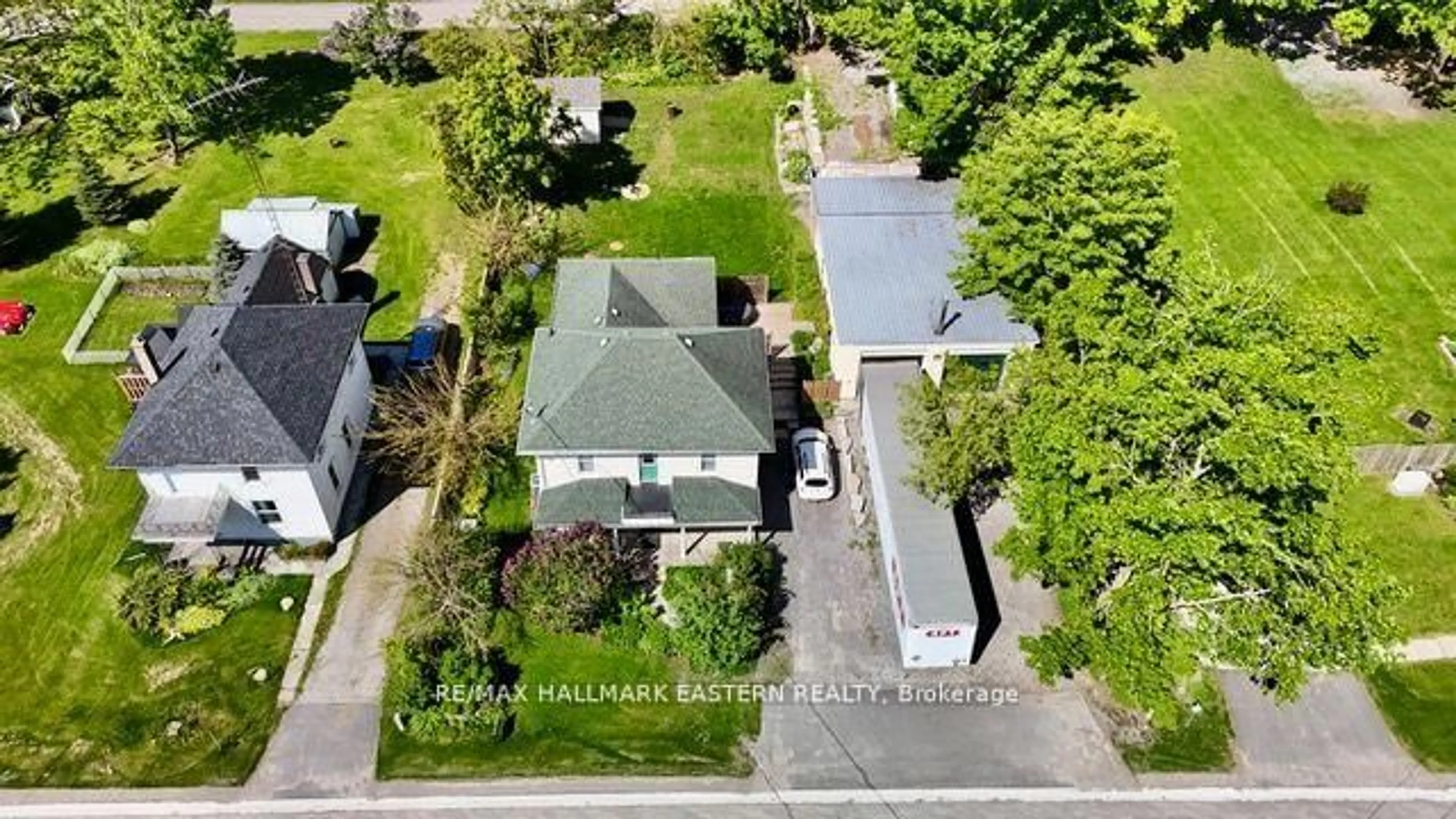 A pic from outside/outdoor area/front of a property/back of a property/a pic from drone, street for 2464 Queen Mary St, Cavan Monaghan Ontario L0A 1C0