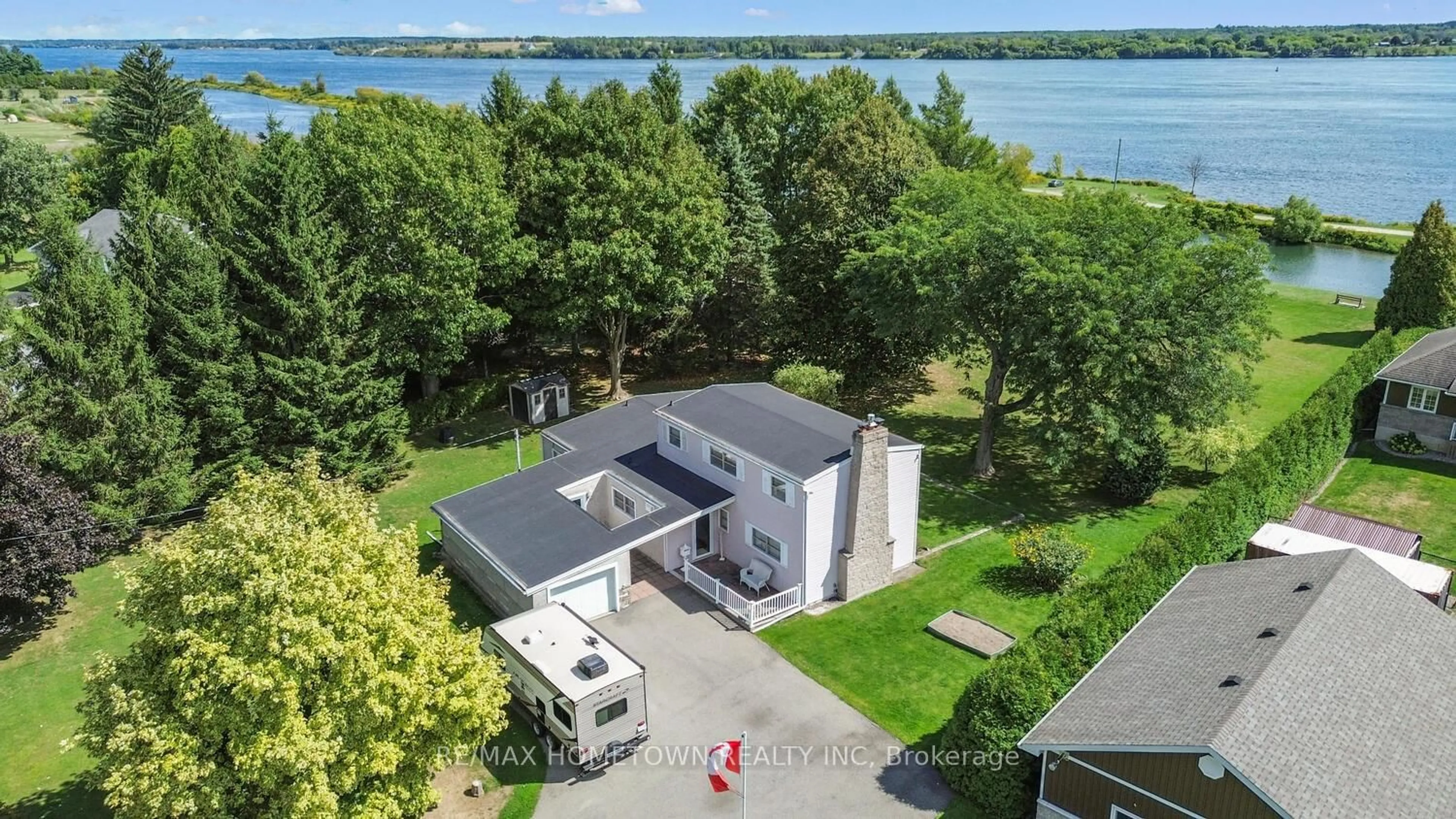 A pic from outside/outdoor area/front of a property/back of a property/a pic from drone, water/lake/river/ocean view for 401 County Road 2 Rd, Edwardsburgh/Cardinal Ontario K0E 1E0