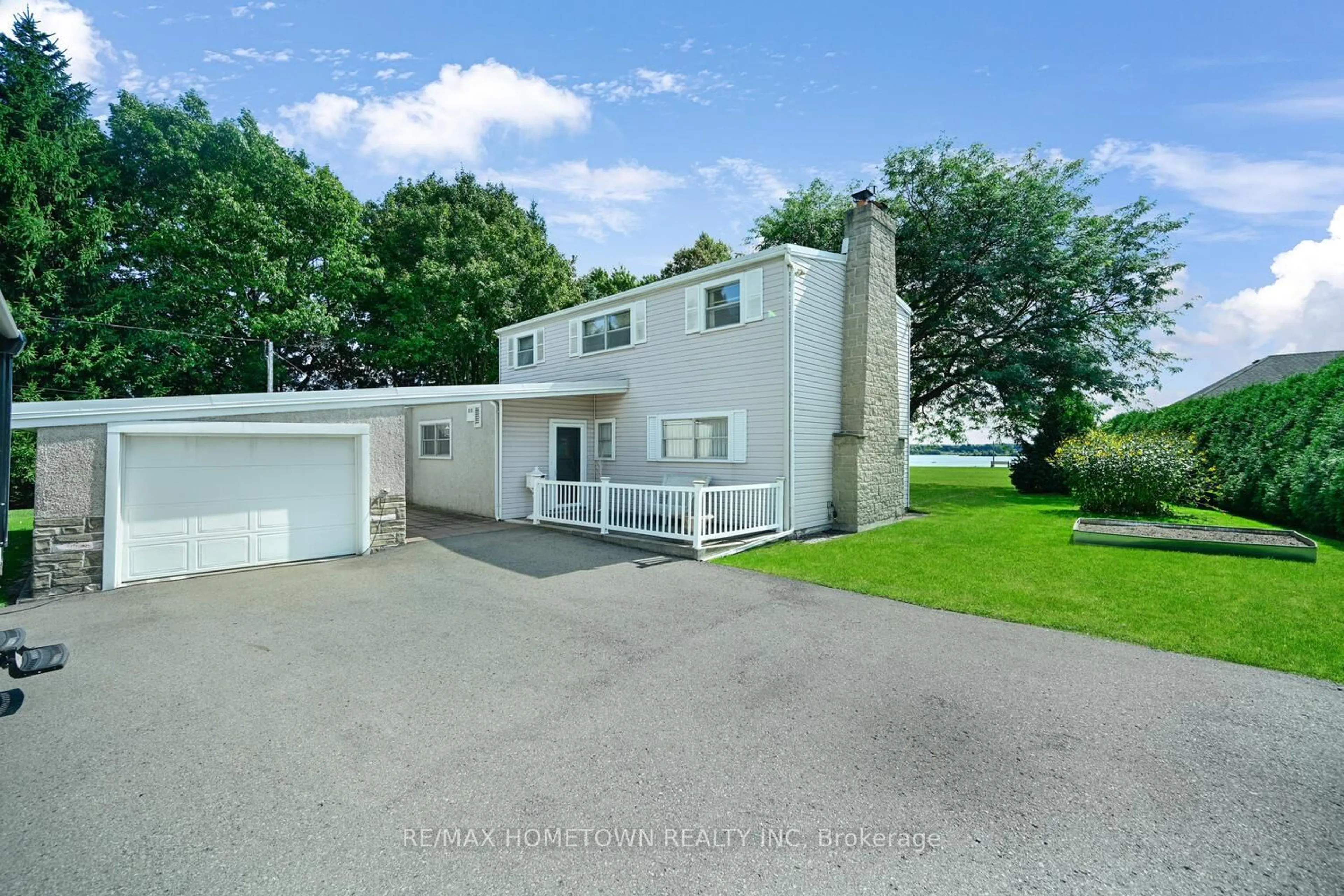 A pic from outside/outdoor area/front of a property/back of a property/a pic from drone, unknown for 401 County Road 2 Rd, Edwardsburgh/Cardinal Ontario K0E 1E0
