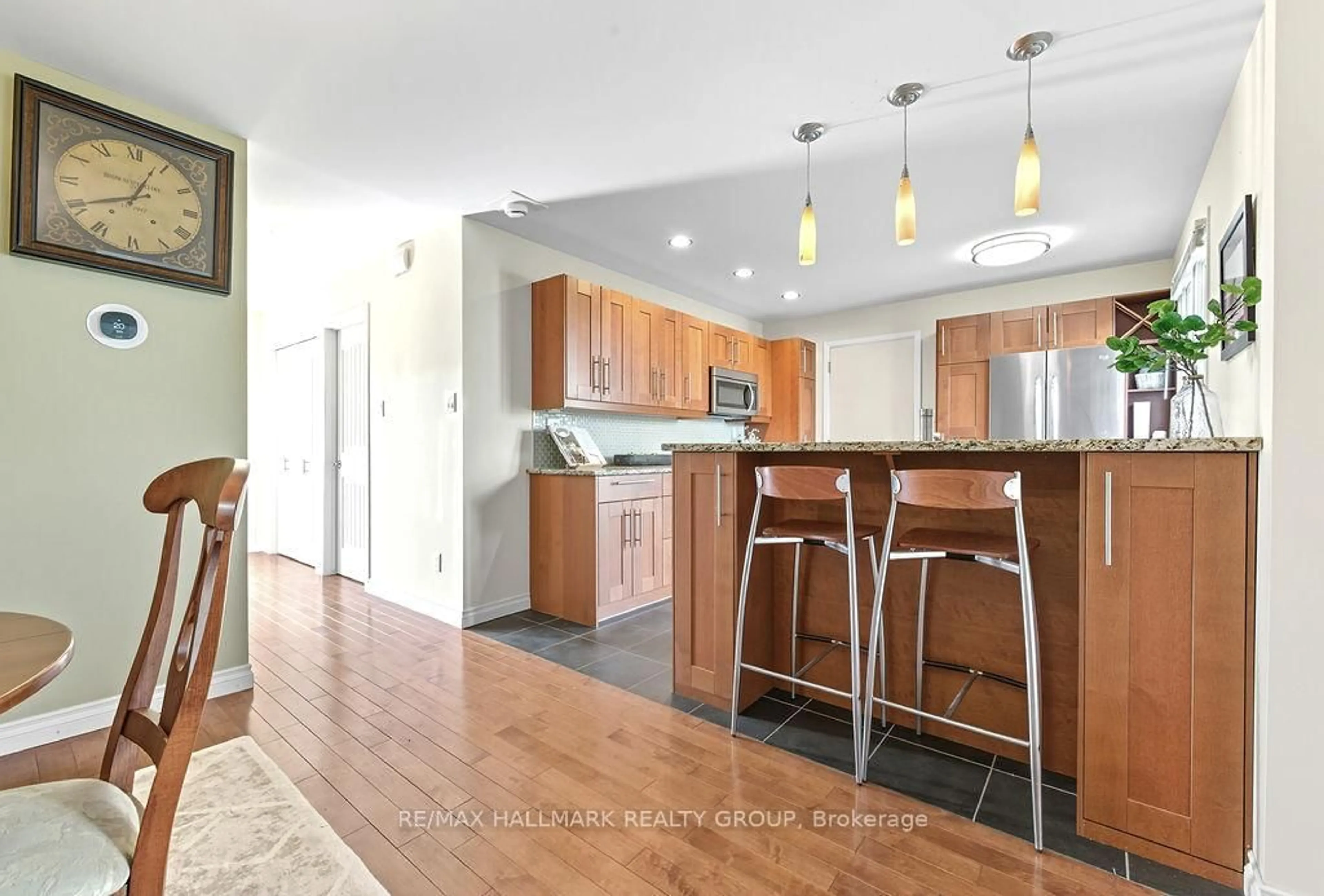 Open concept kitchen, wood/laminate floor for 29D Varley Dr, Ottawa Ontario K2K 1G4