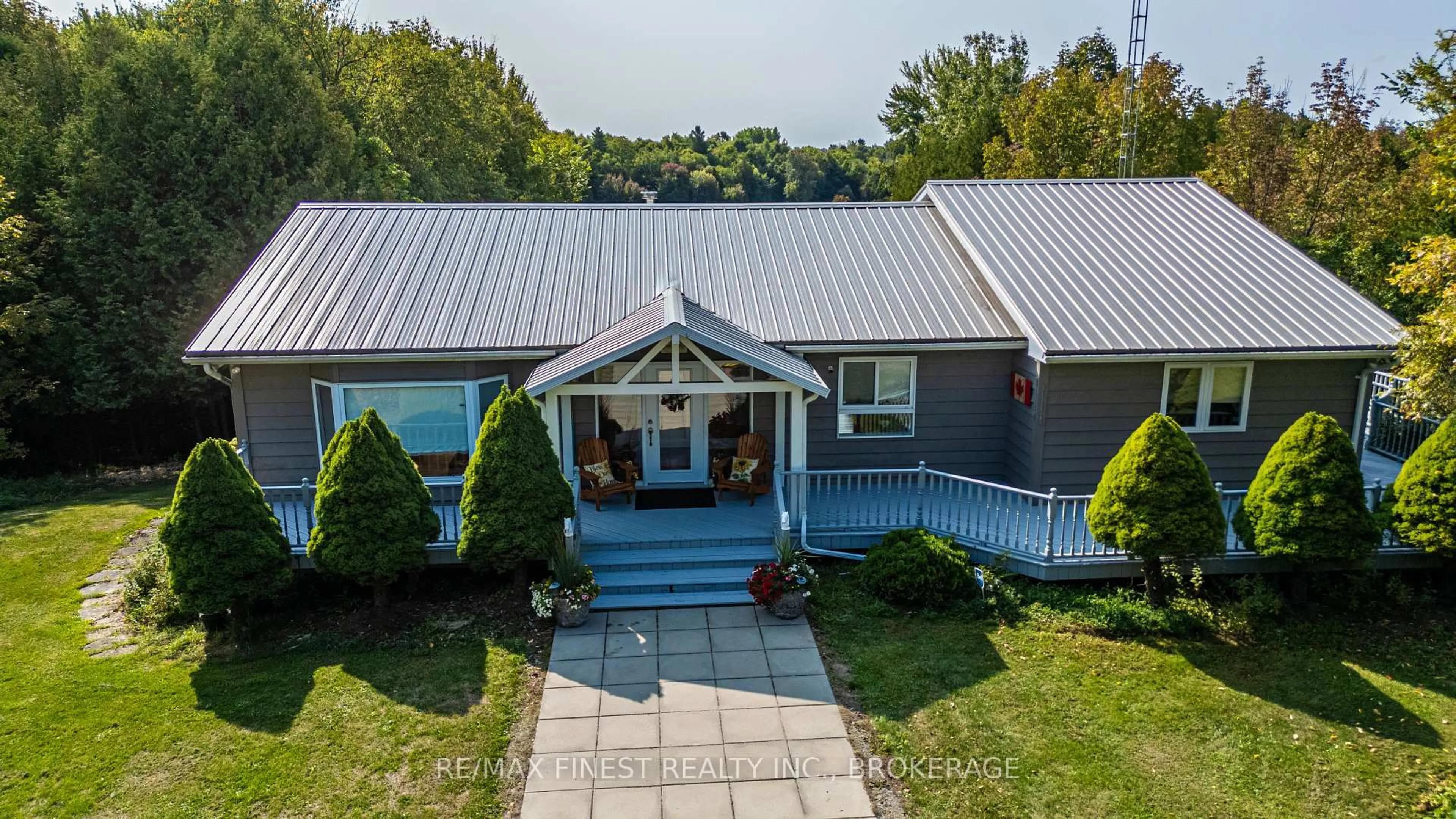 A pic from outside/outdoor area/front of a property/back of a property/a pic from drone, unknown for 180 Napanee Rd, Tweed Ontario K0K 2L0