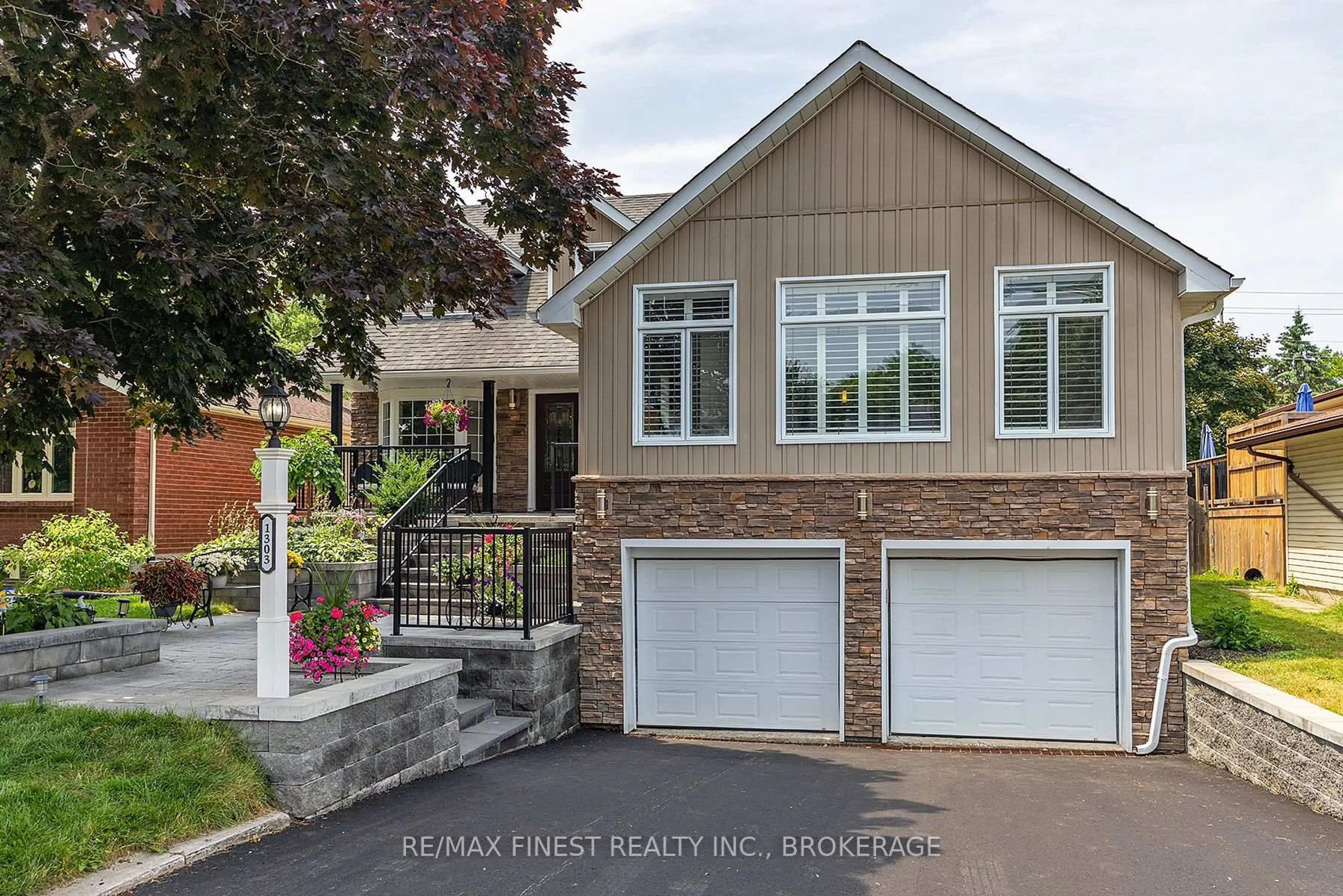 Home with brick exterior material, street for 1303 Rockwood Dr, Kingston Ontario K7P 1X6