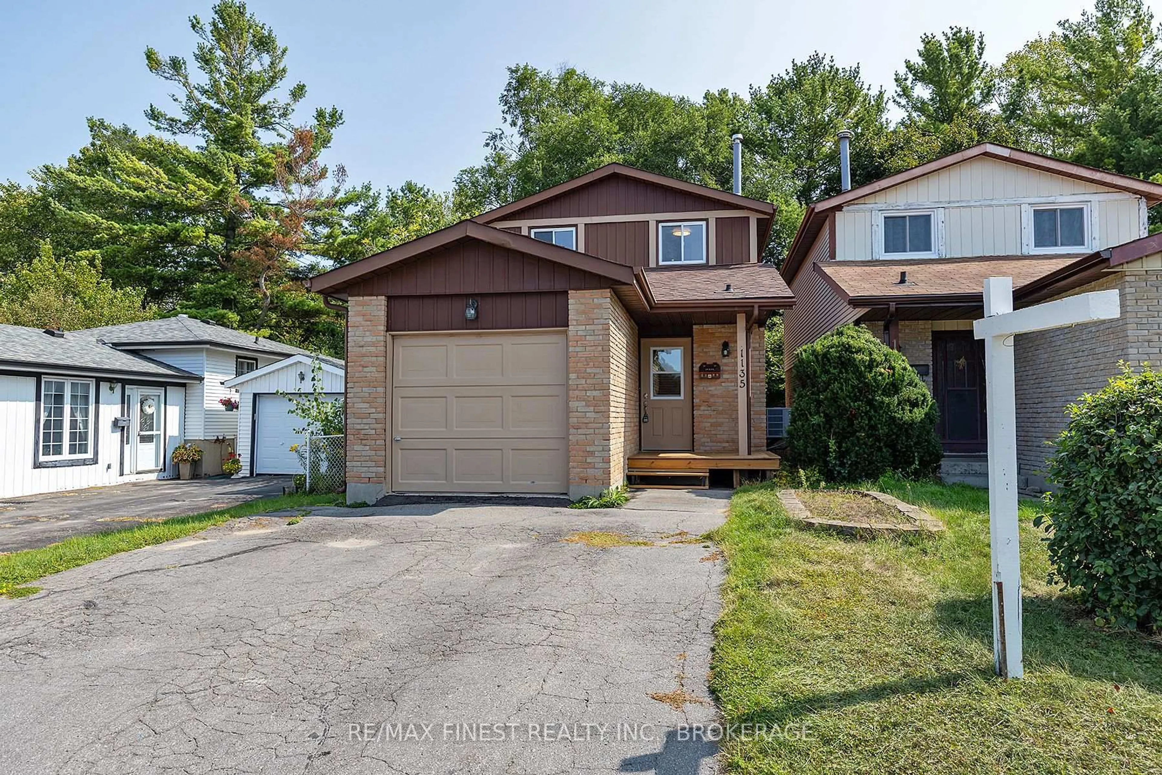 Home with vinyl exterior material, street for 1135 Basswood Pl, Kingston Ontario K7P 1K4