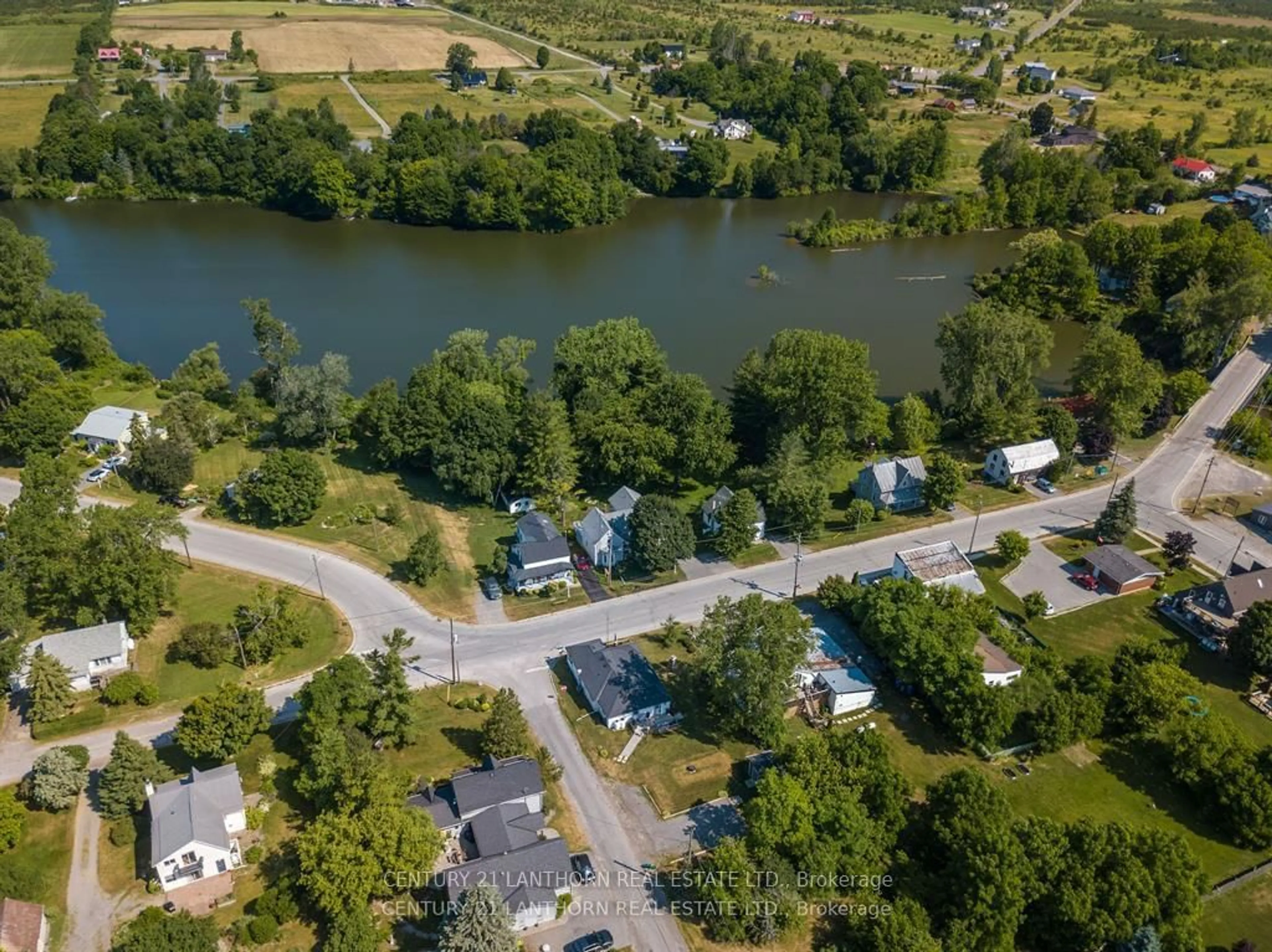 A pic from outside/outdoor area/front of a property/back of a property/a pic from drone, water/lake/river/ocean view for 13 St Philip St, Prince Edward County Ontario K0K 2P0