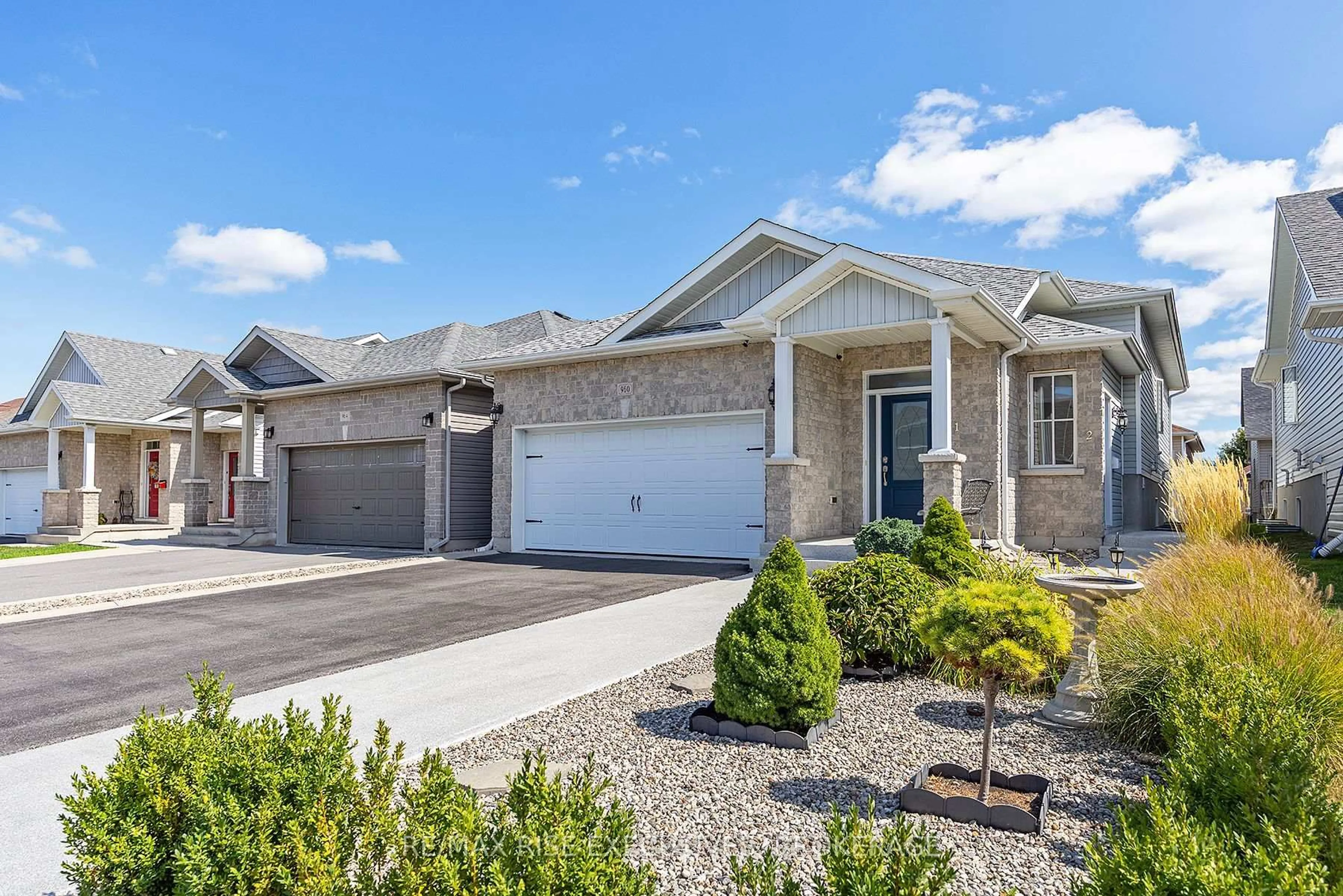 Home with vinyl exterior material, street for 960 Edward Riley Dr, Kingston Ontario K7P 0J7