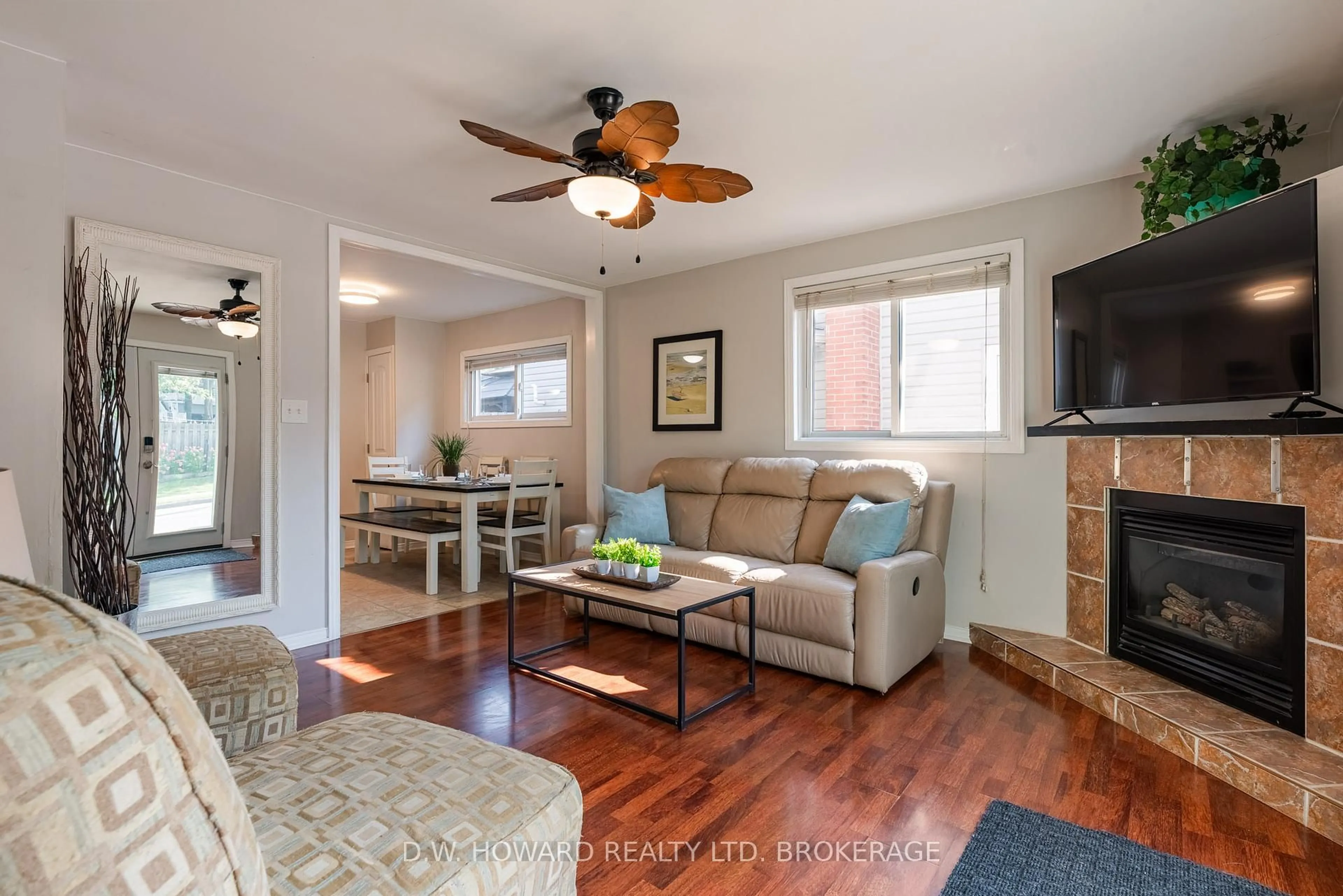 Living room with furniture, wood/laminate floor for 4084 Erie Rd, Fort Erie Ontario L0S 1B0