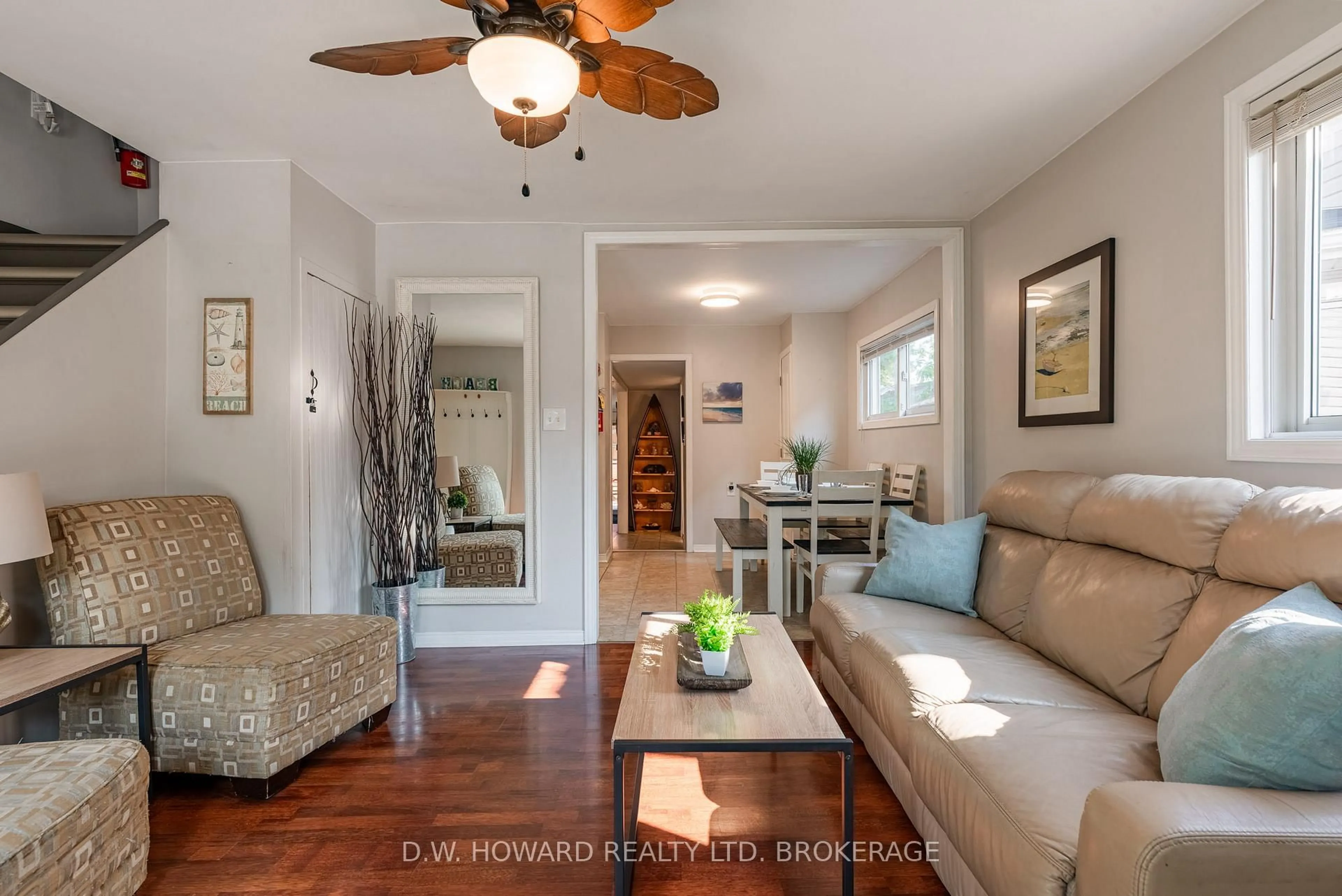 Living room with furniture, wood/laminate floor for 4084 Erie Rd, Fort Erie Ontario L0S 1B0