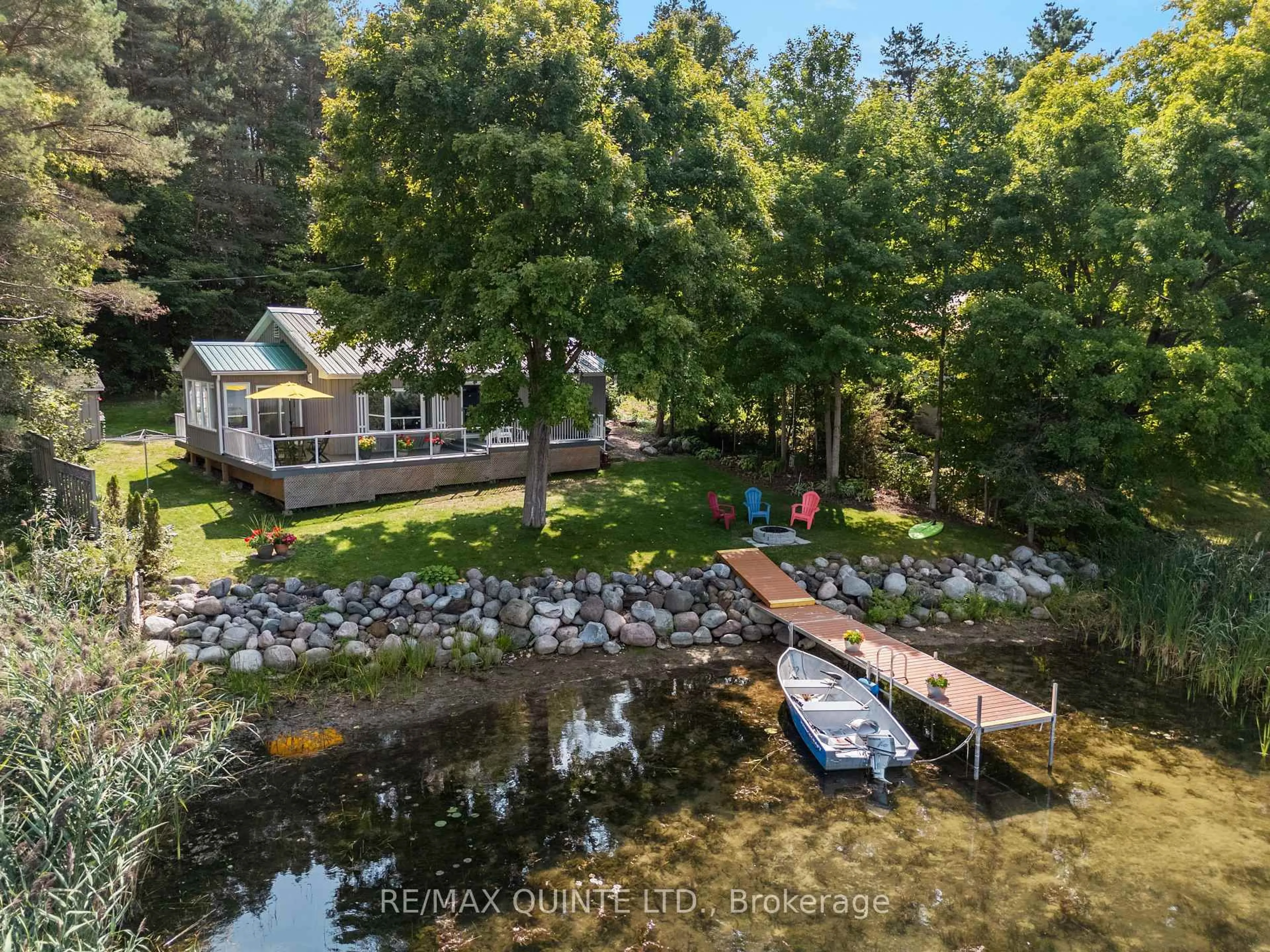 A pic from outside/outdoor area/front of a property/back of a property/a pic from drone, water/lake/river/ocean view for 89 Curry Lane, Prince Edward County Ontario K0K 1P0