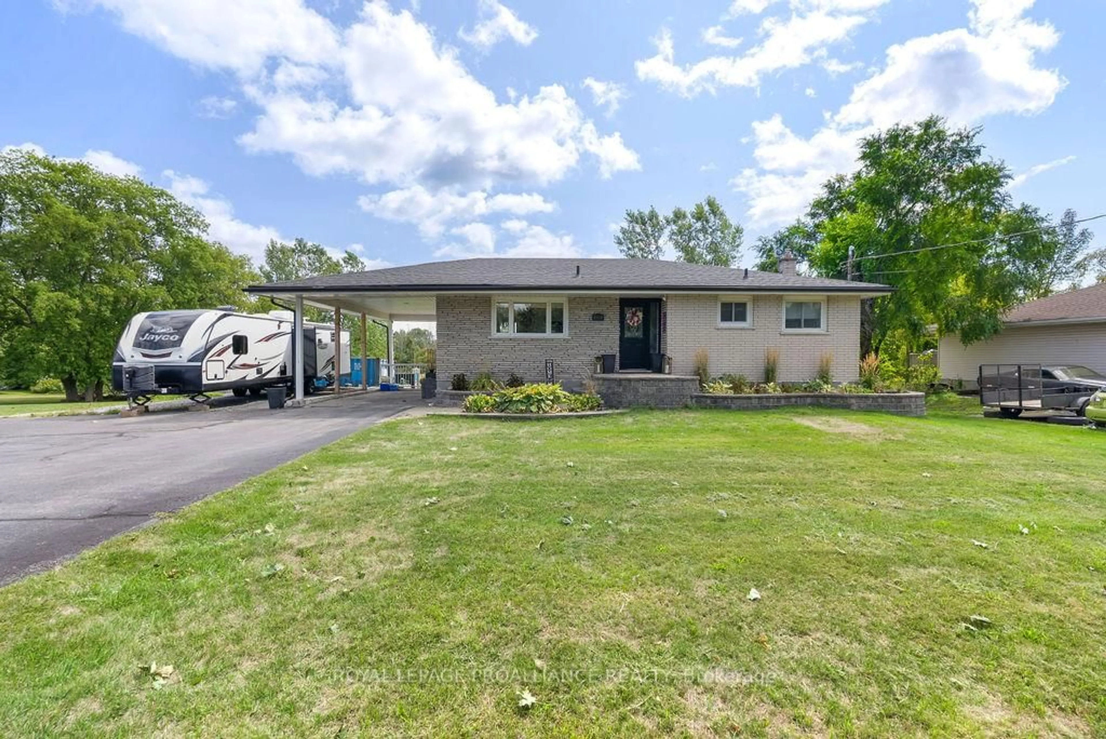 Home with vinyl exterior material, street for 16395 2 Highway, Trenton Ontario K8V 5P7