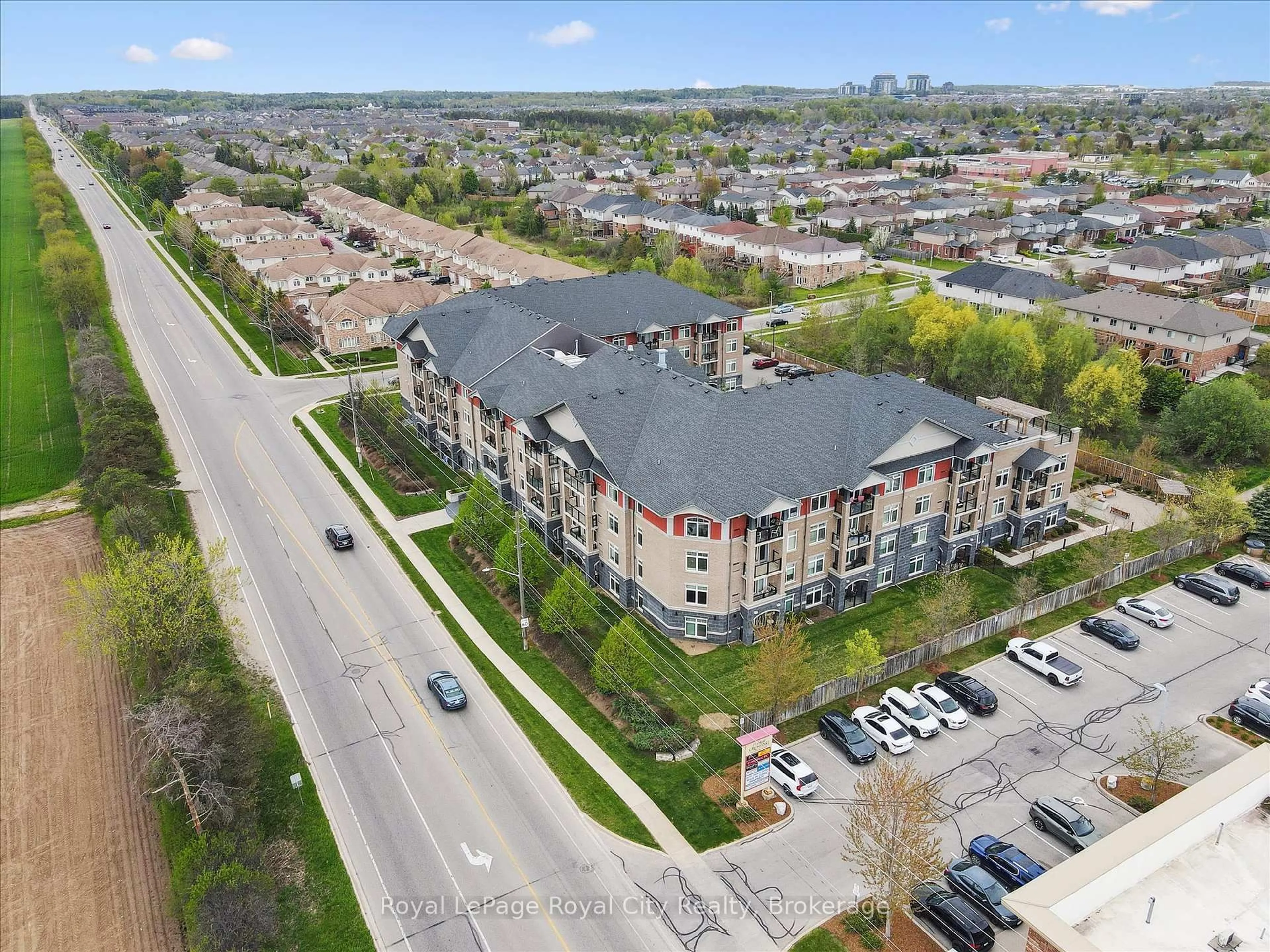 A pic from outside/outdoor area/front of a property/back of a property/a pic from drone, street for 106 Bard Blvd #202, Guelph Ontario N1L 0L8
