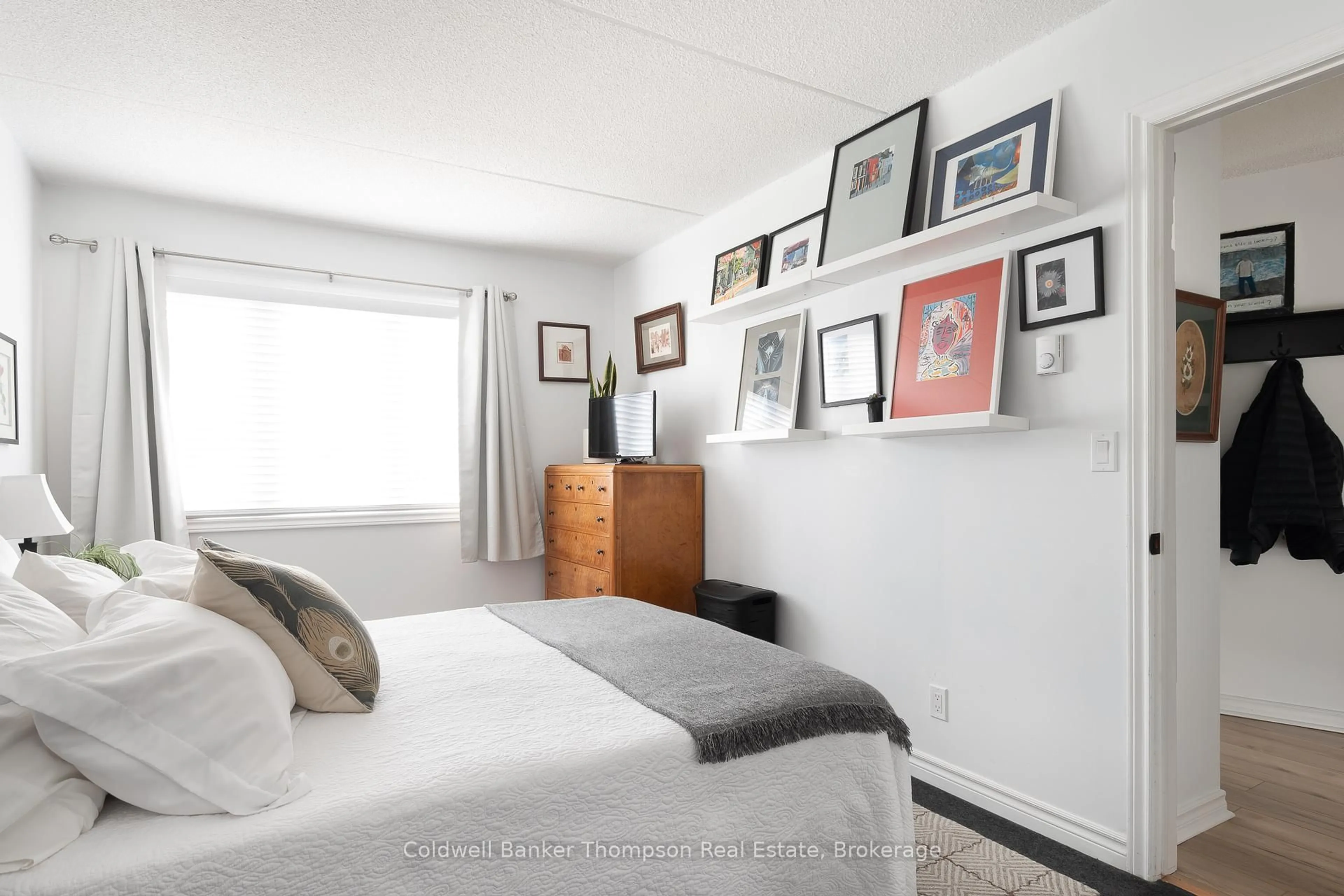 Bedroom with bed, unknown for 5 Church St #104, Huntsville Ontario P1H 1G9