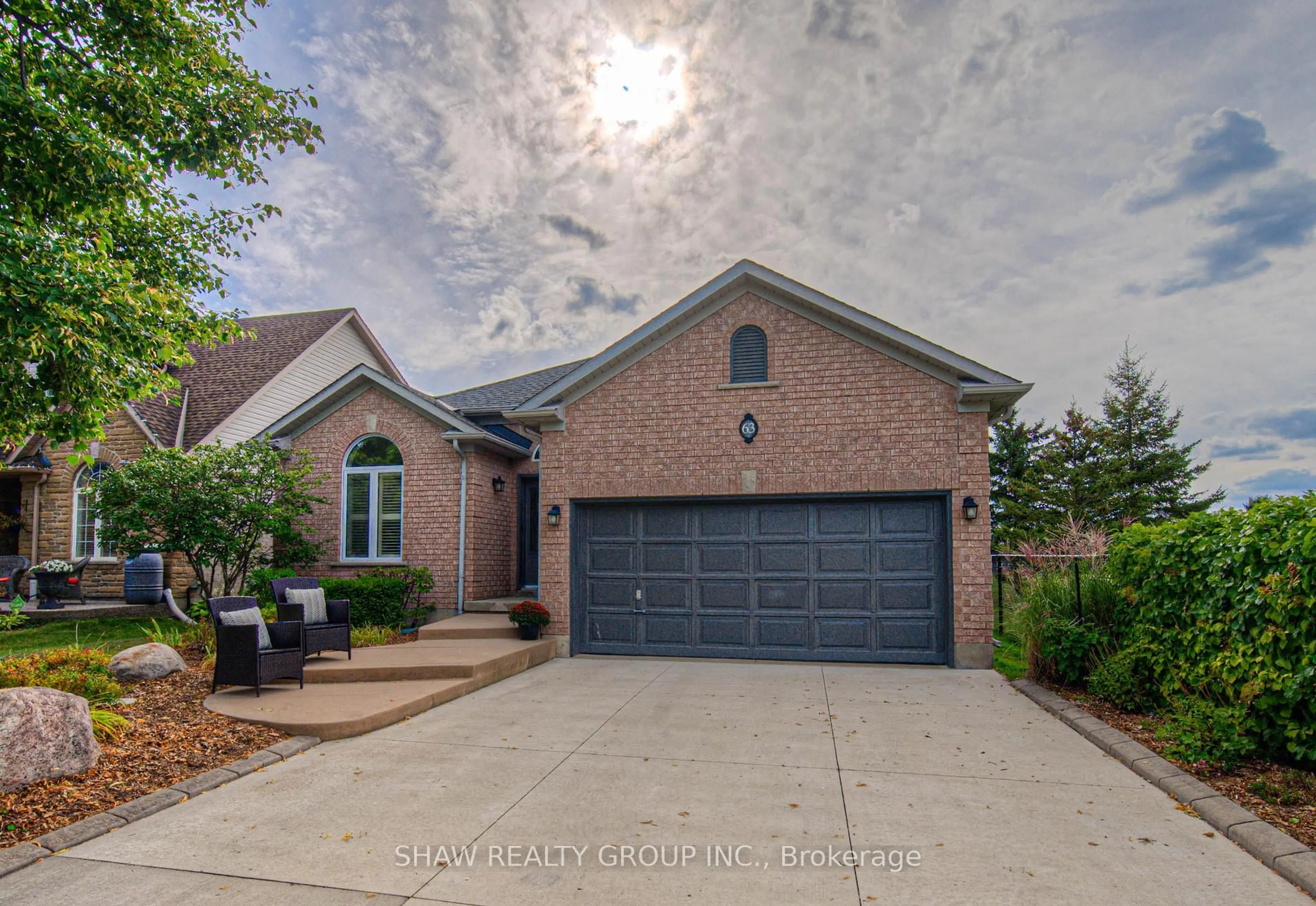 Home with brick exterior material, street for 63 Gatehouse Dr, Cambridge Ontario N1P 1C7