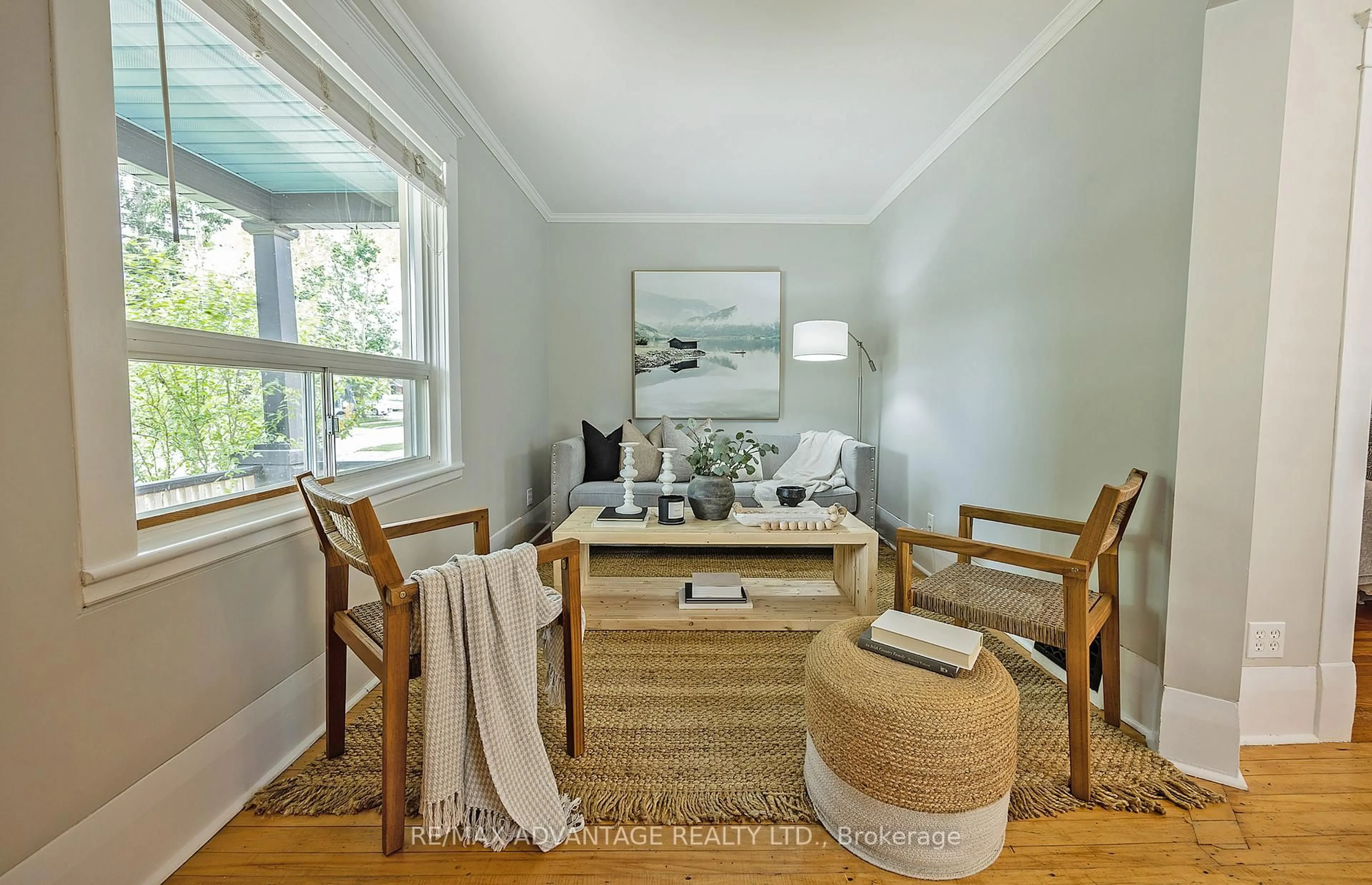 Living room with furniture, wood/laminate floor for 30 Langarth St, London South Ontario N6C 1Z1