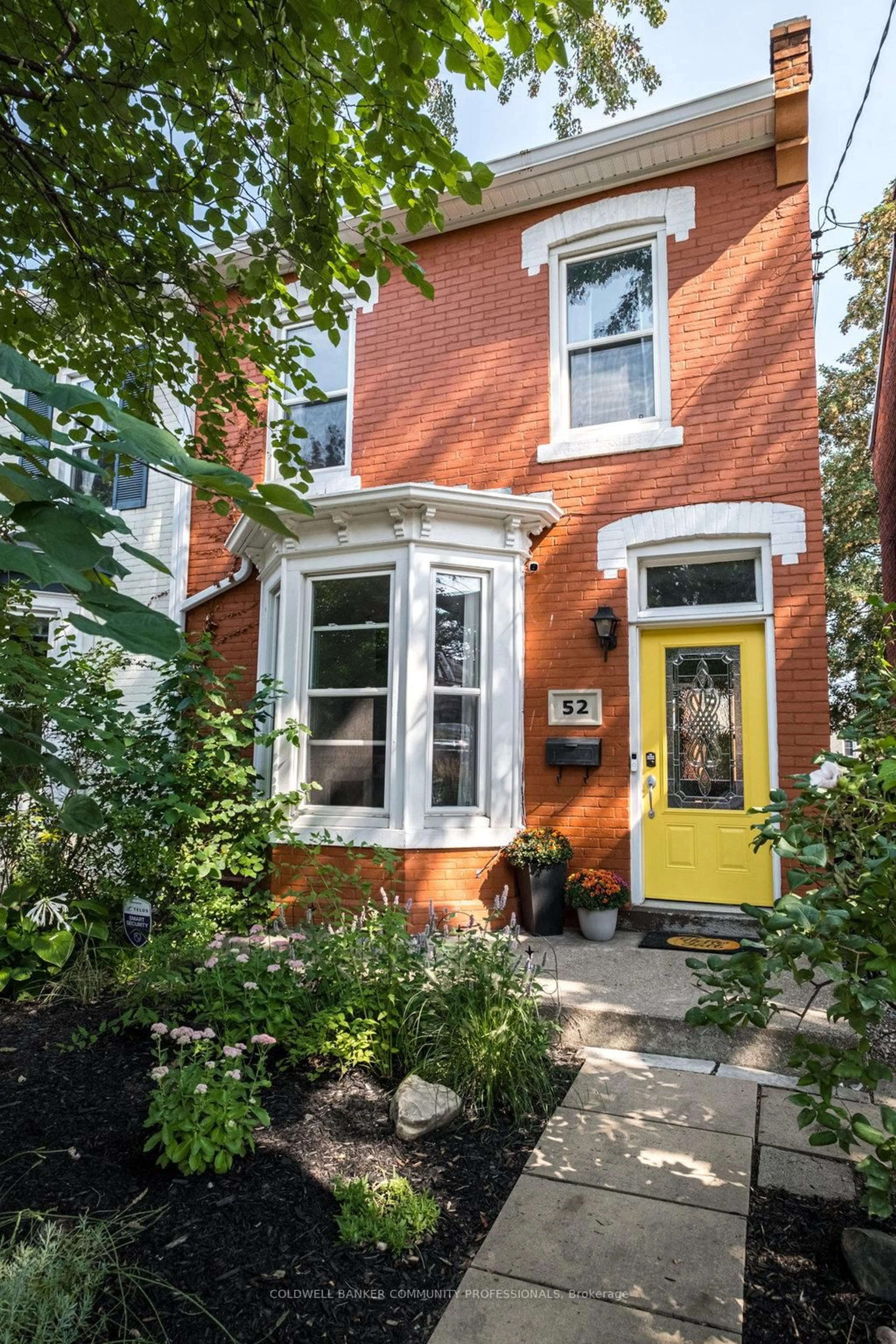 Home with brick exterior material, street for 52 Emerald St, Hamilton Ontario L8L 5K3