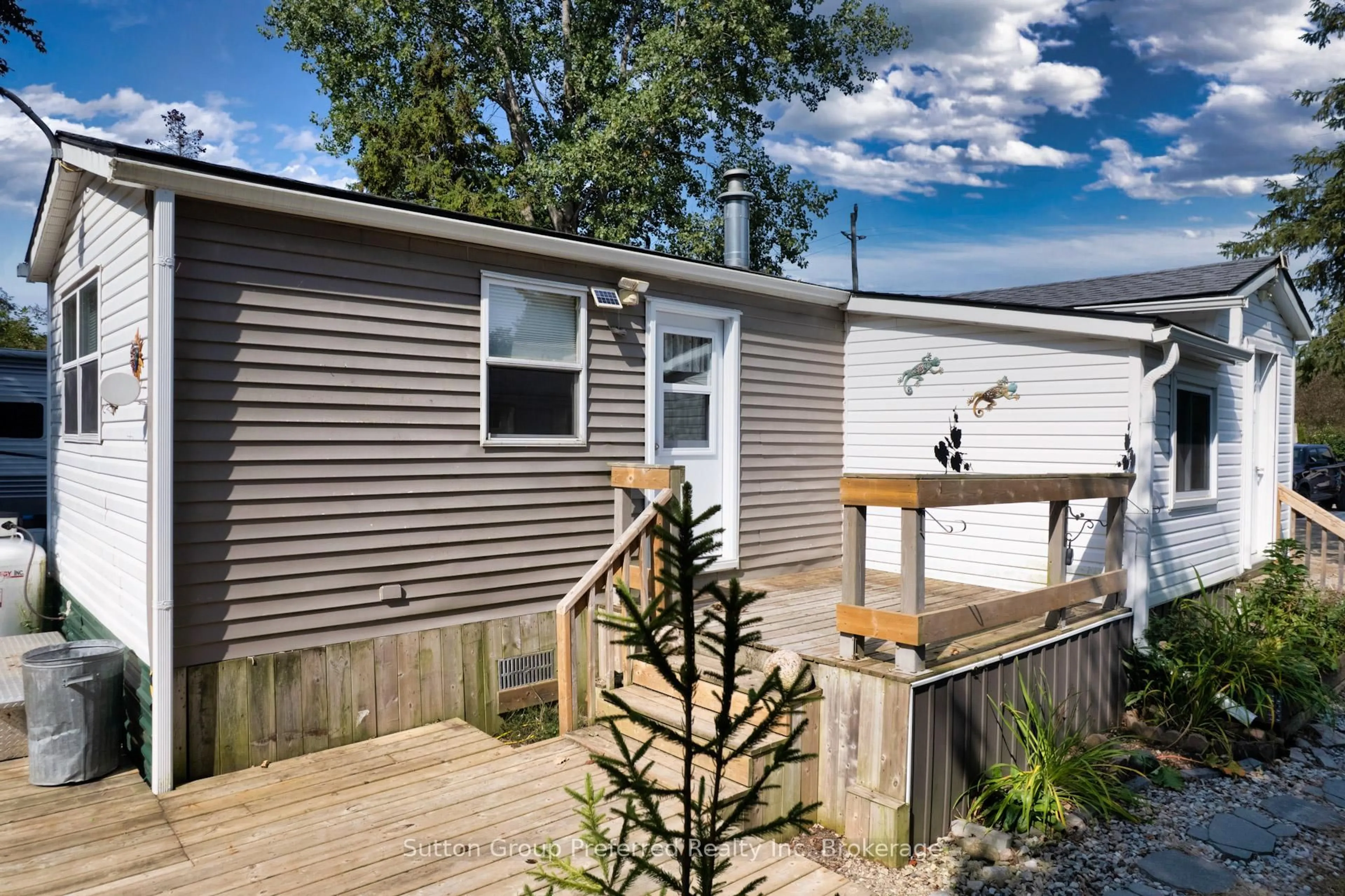 Home with vinyl exterior material, street for 495856 10th Line, East Zorra-Tavistock Ontario N4S 7V7