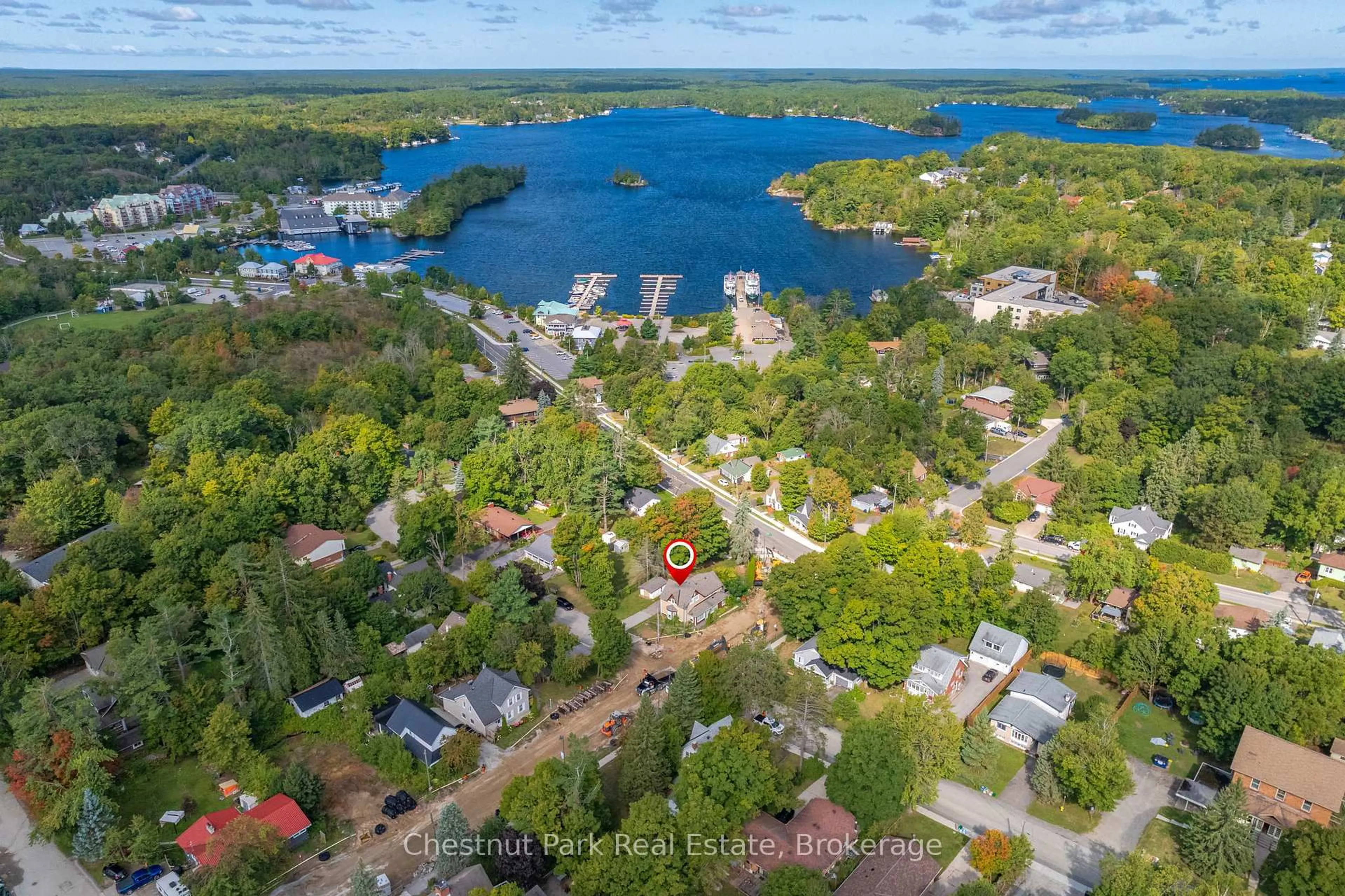 A pic from outside/outdoor area/front of a property/back of a property/a pic from drone, water/lake/river/ocean view for 615 Bay St, Gravenhurst Ontario P1P 1G8