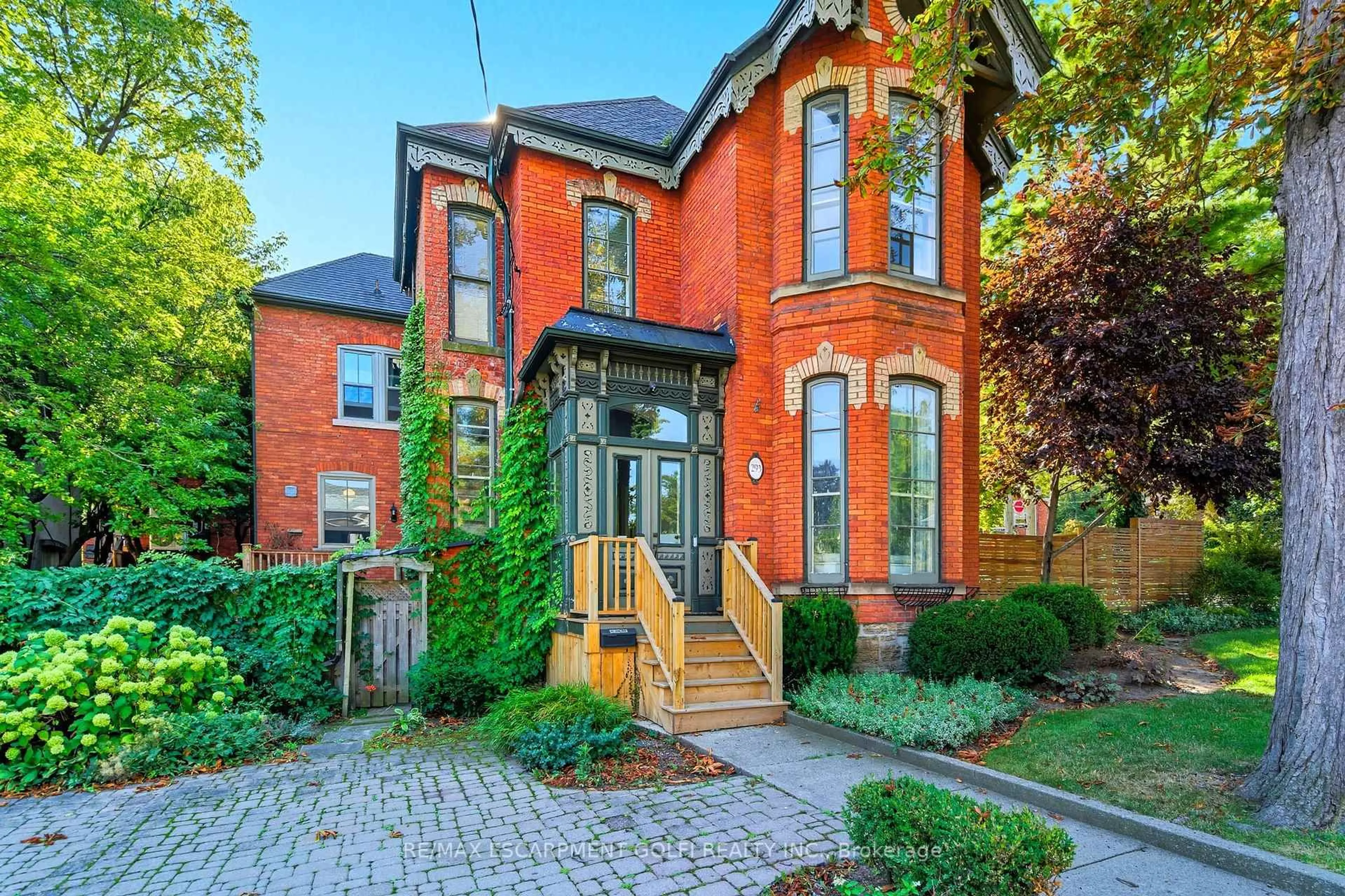 Home with brick exterior material, street for 293 Park St, Hamilton Ontario L8P 3G5