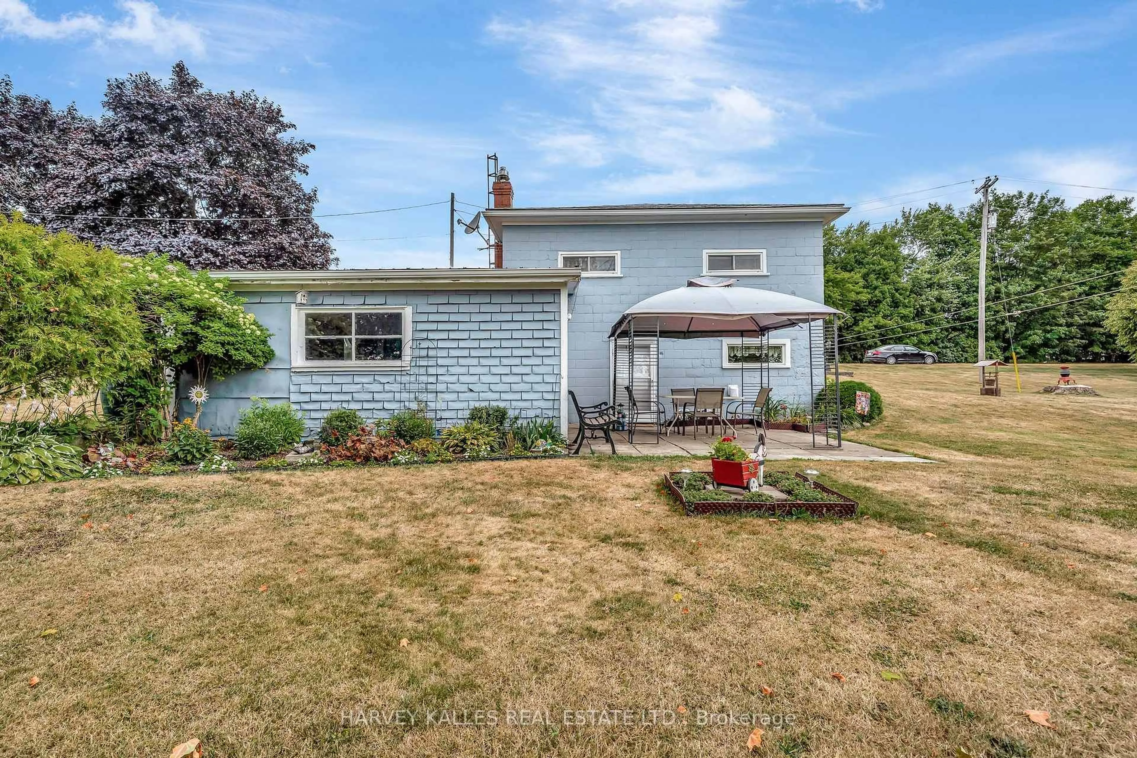 A pic from outside/outdoor area/front of a property/back of a property/a pic from drone, unknown for 13997 Loyalist Pkwy, Prince Edward County Ontario K0K 2T0