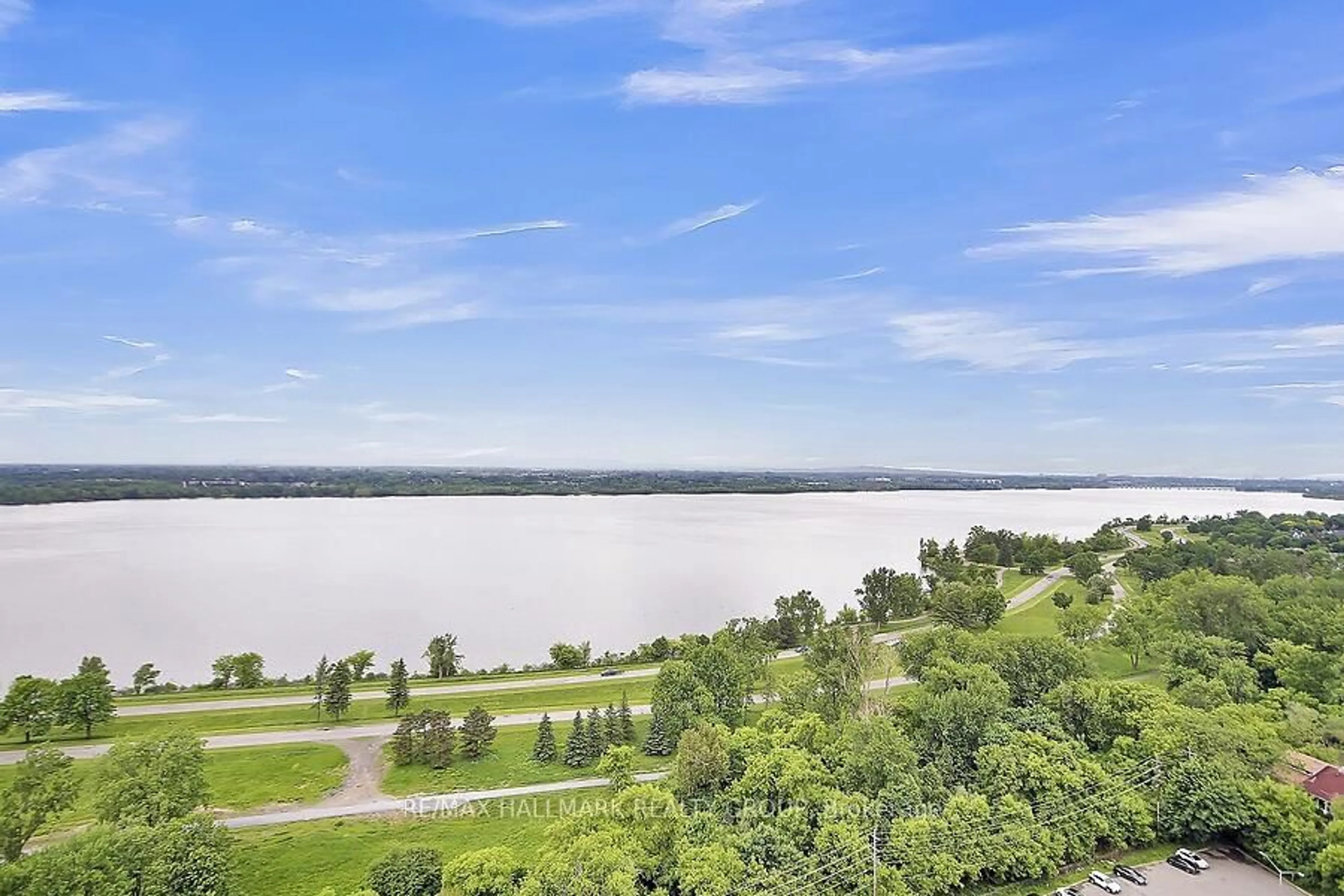 A pic from outside/outdoor area/front of a property/back of a property/a pic from drone, water/lake/river/ocean view for 1081 Ambleside Dr #410, Ottawa Ontario K2B 8C8