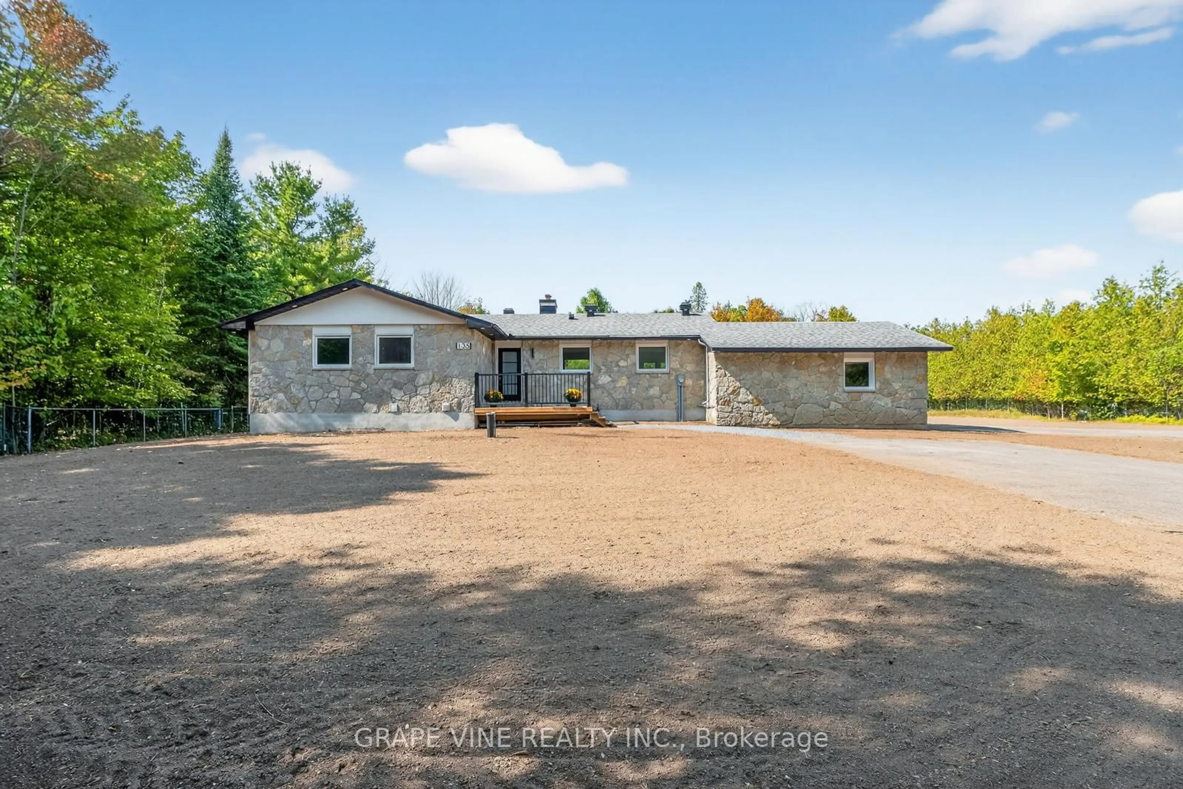 A pic from outside/outdoor area/front of a property/back of a property/a pic from drone, building for 135 Manion Rd, Carp Ontario K0A 1L0