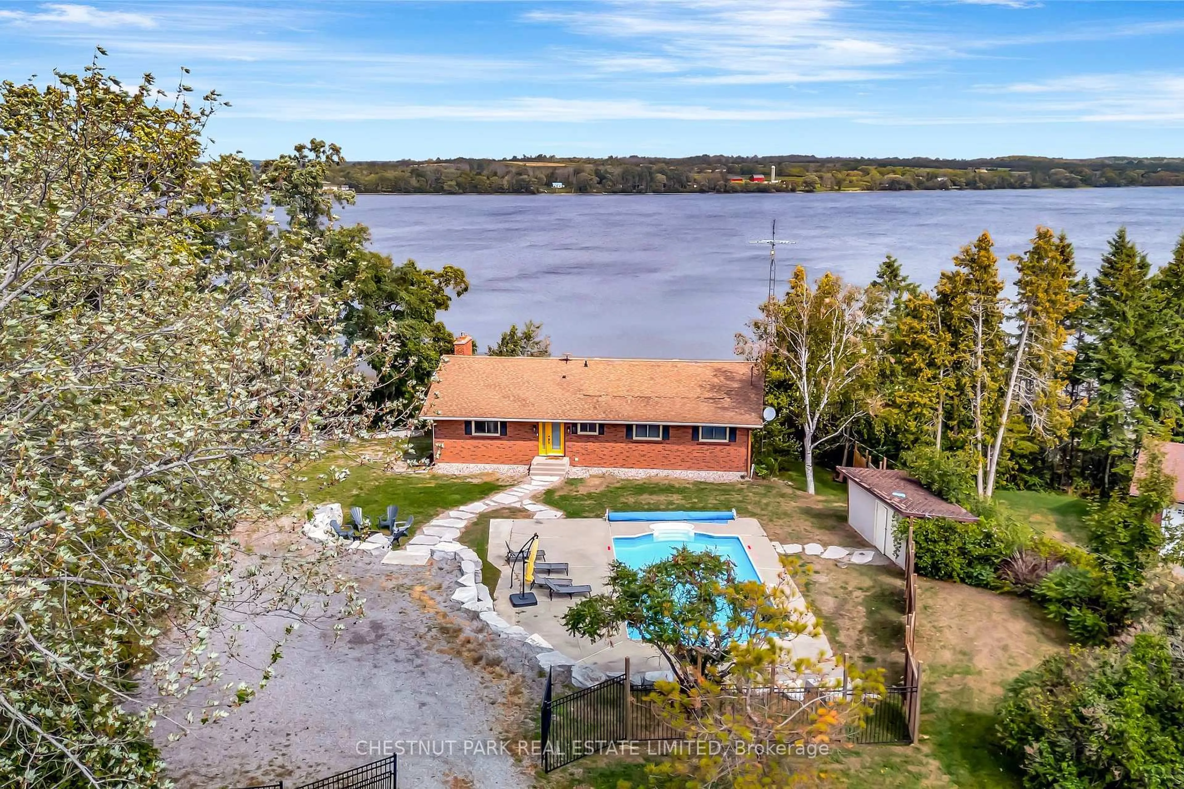 A pic from outside/outdoor area/front of a property/back of a property/a pic from drone, water/lake/river/ocean view for 5404 County Road 1, Prince Edward County Ontario K0K 1T0
