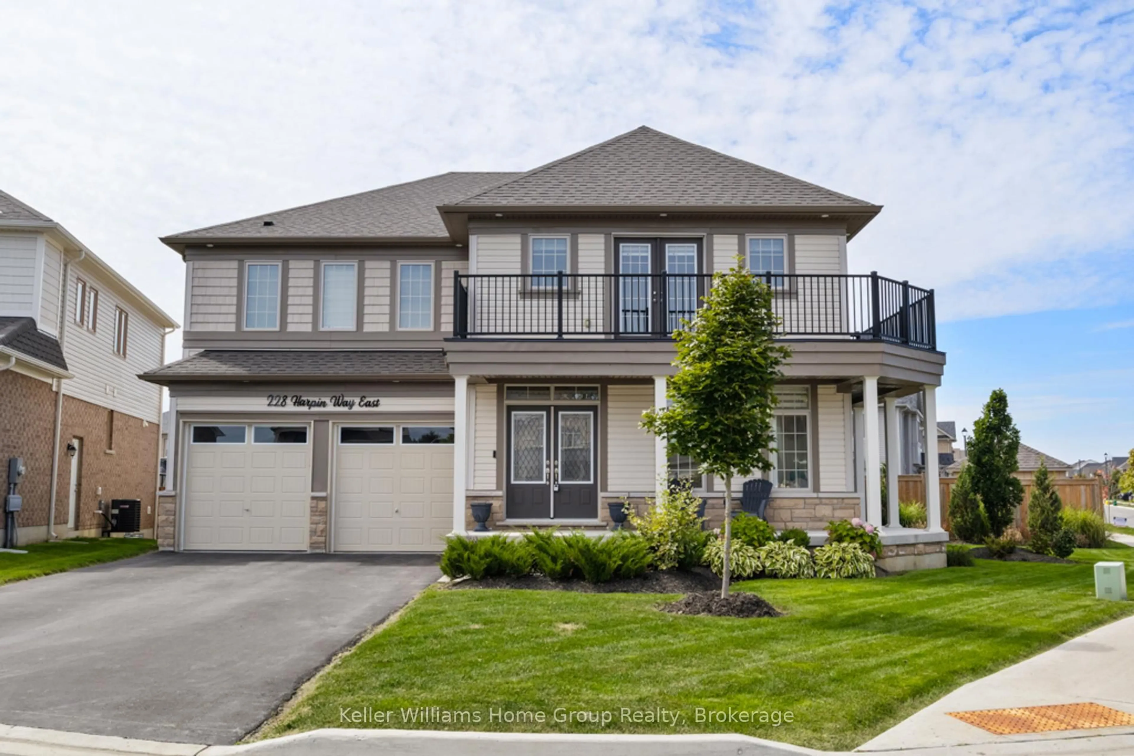 Home with vinyl exterior material, street for 228 Harpin Way, Centre Wellington Ontario N1M 0G8