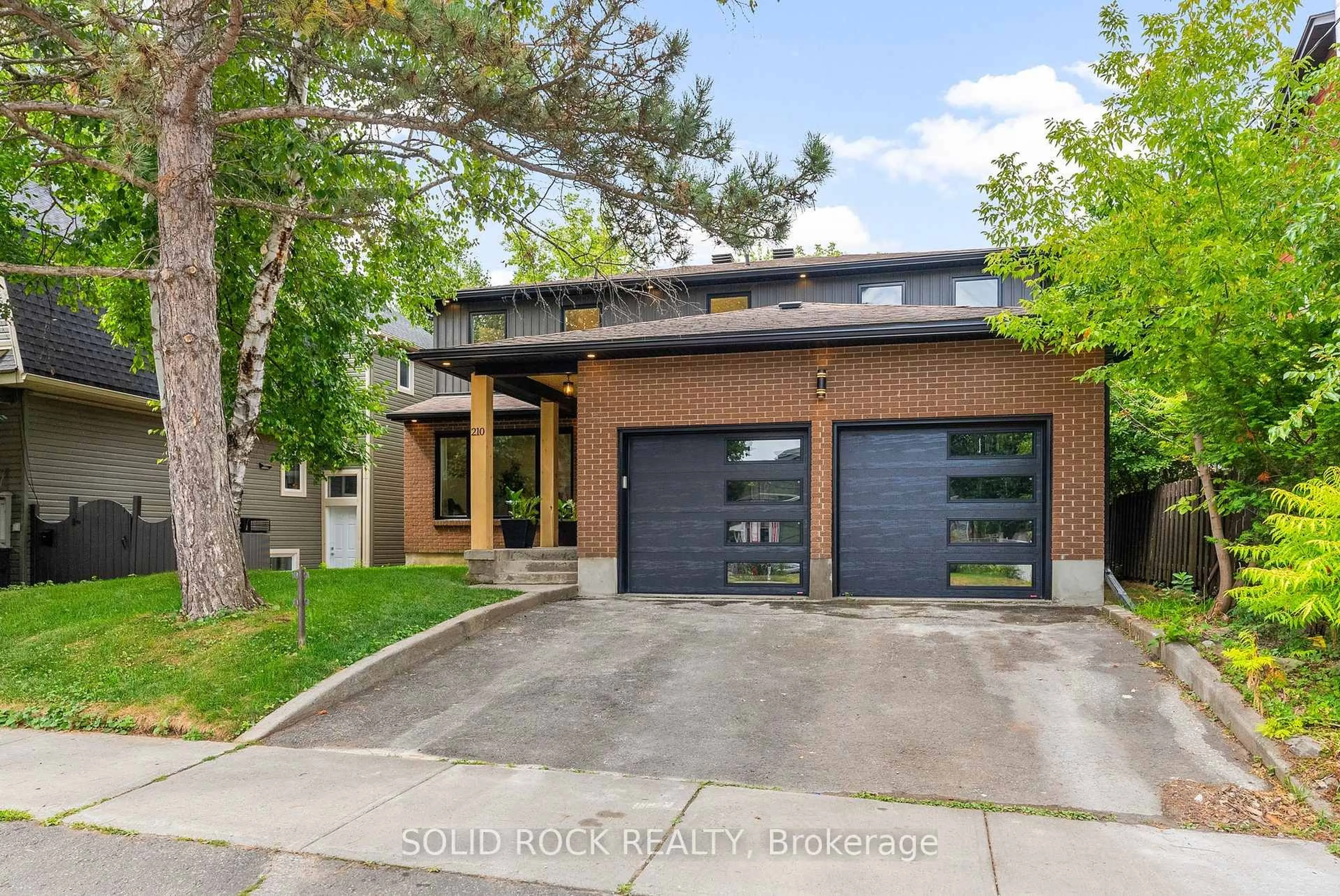 Home with brick exterior material, street for 210 Carleton Ave, Ottawa Ontario K1Y 0J3