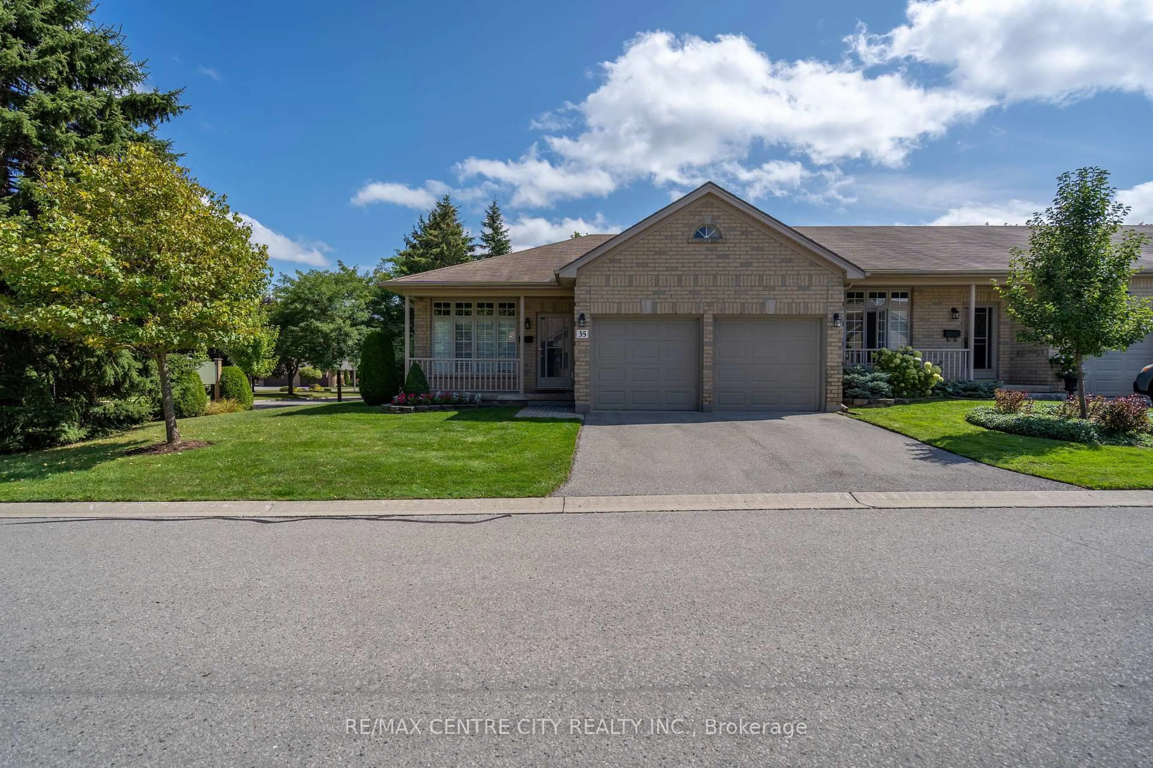 A pic from outside/outdoor area/front of a property/back of a property/a pic from drone, street for 7 Cadeau Terr #35, London South Ontario N6K 4S8