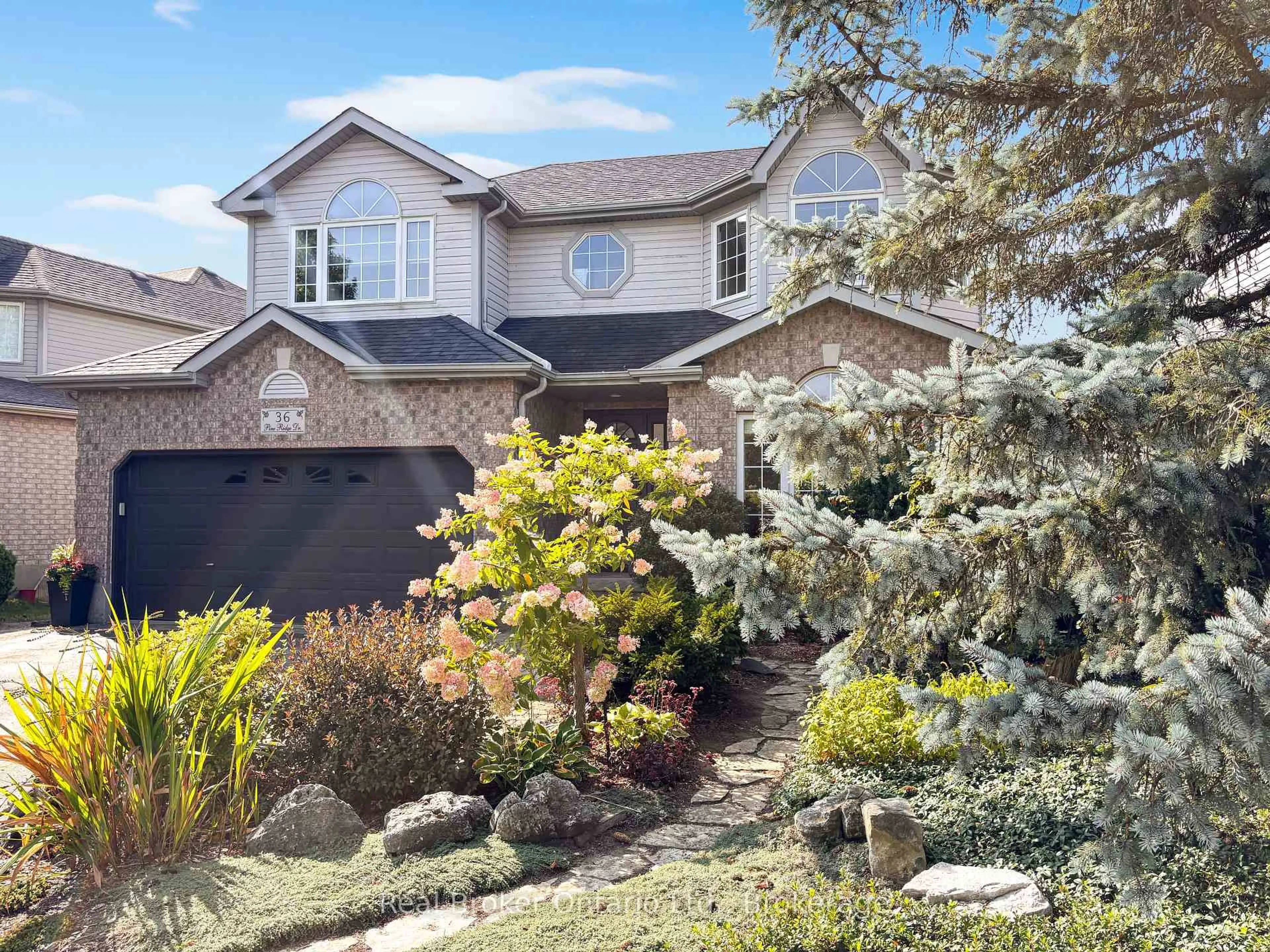Home with vinyl exterior material, street for 36 Pine Ridge Dr, Guelph Ontario N1L 1K3