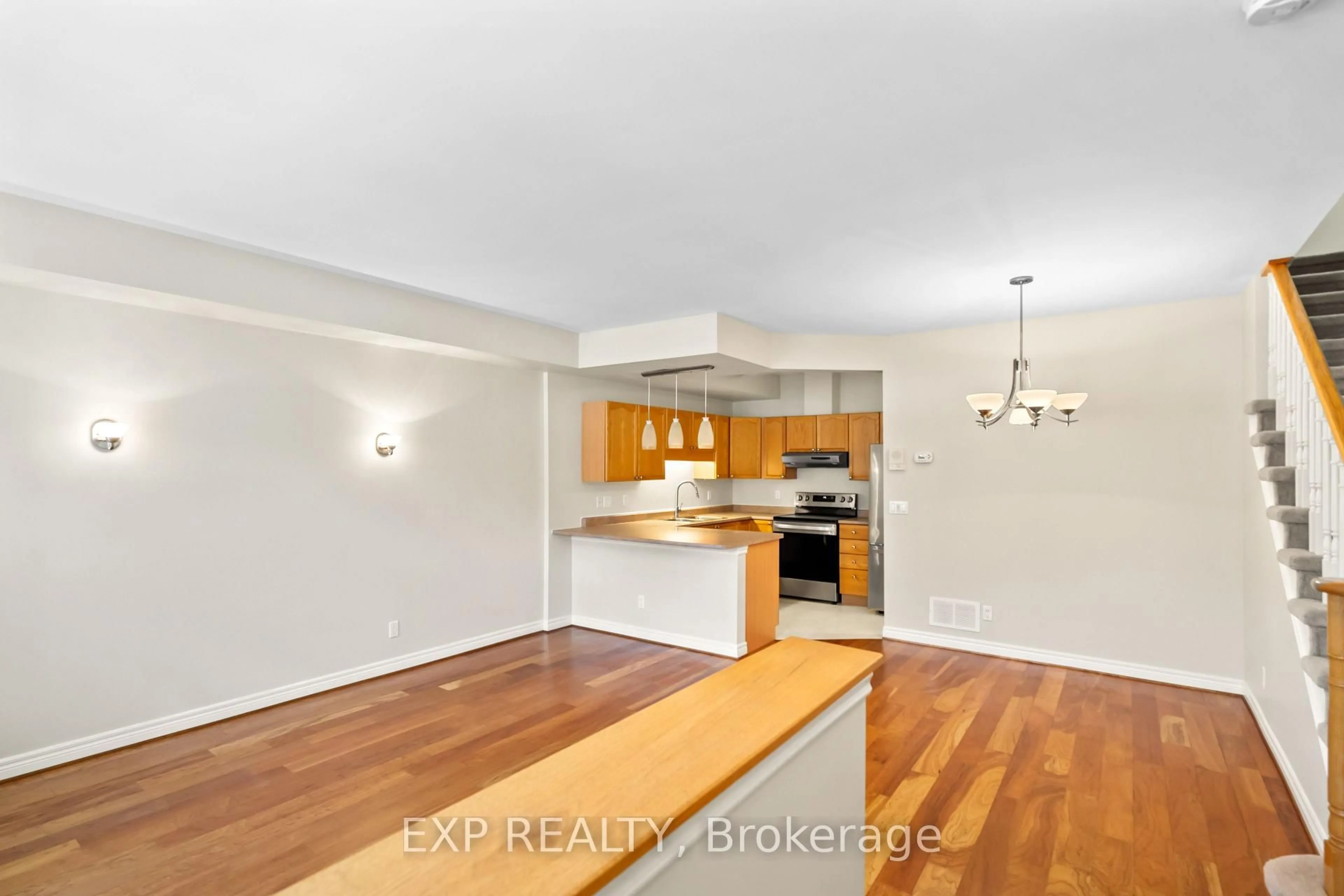 Open concept kitchen, wood/laminate floor for 134 Hibernia St, Cobourg Ontario K9A 3J8