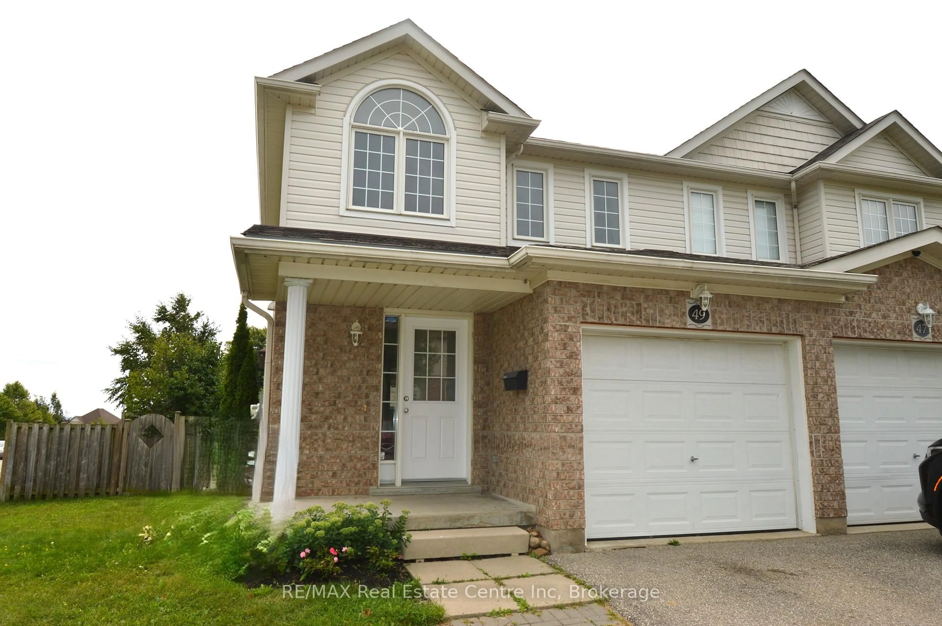 Home with brick exterior material, street for 49 Edwards St, Guelph Ontario N1E 0B8
