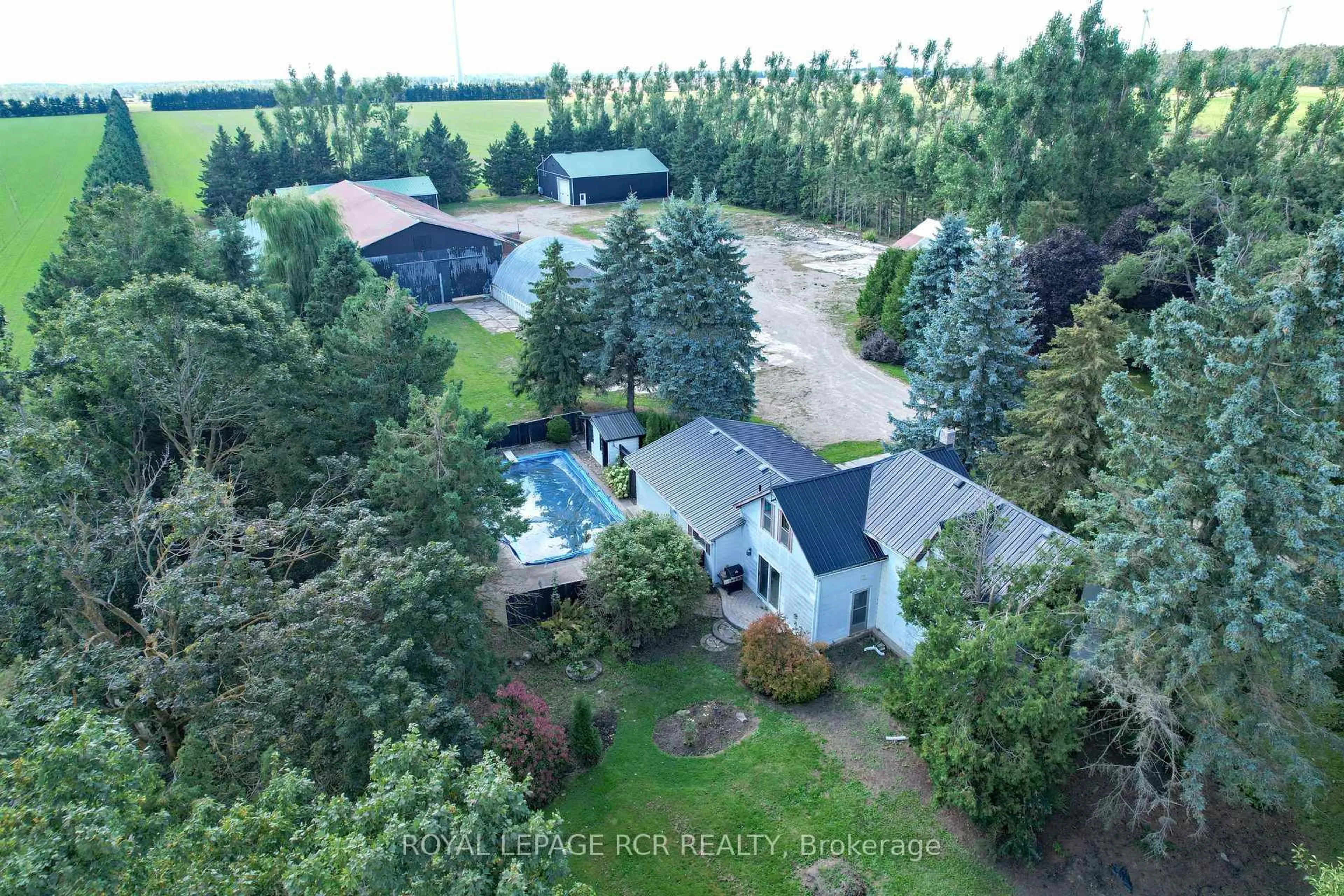 A pic from outside/outdoor area/front of a property/back of a property/a pic from drone, forest/trees view for 518156 124 Highway, Melancthon Ontario L9V 1V9