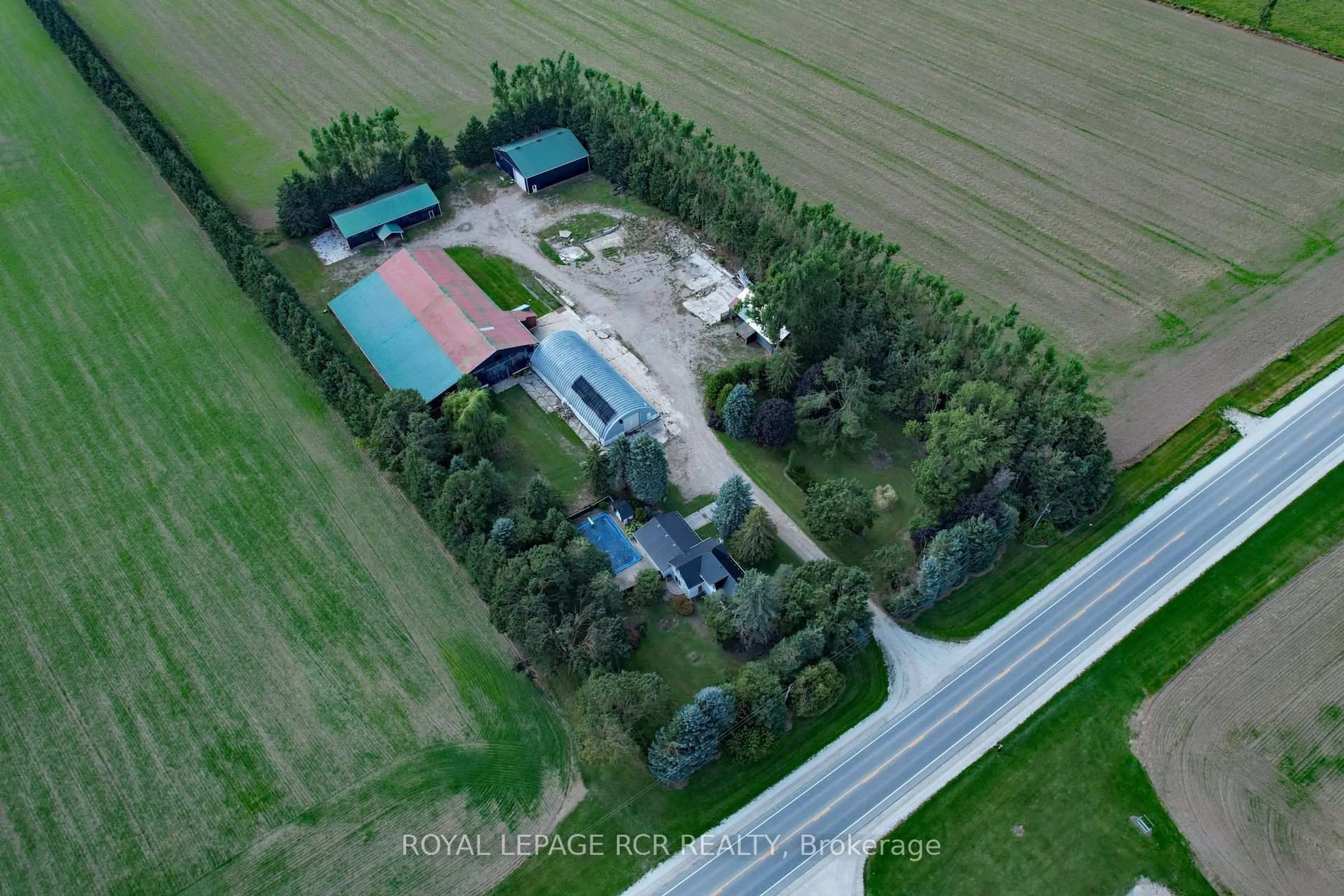 A pic from outside/outdoor area/front of a property/back of a property/a pic from drone, building for 518156 124 Highway, Melancthon Ontario L9V 1V9