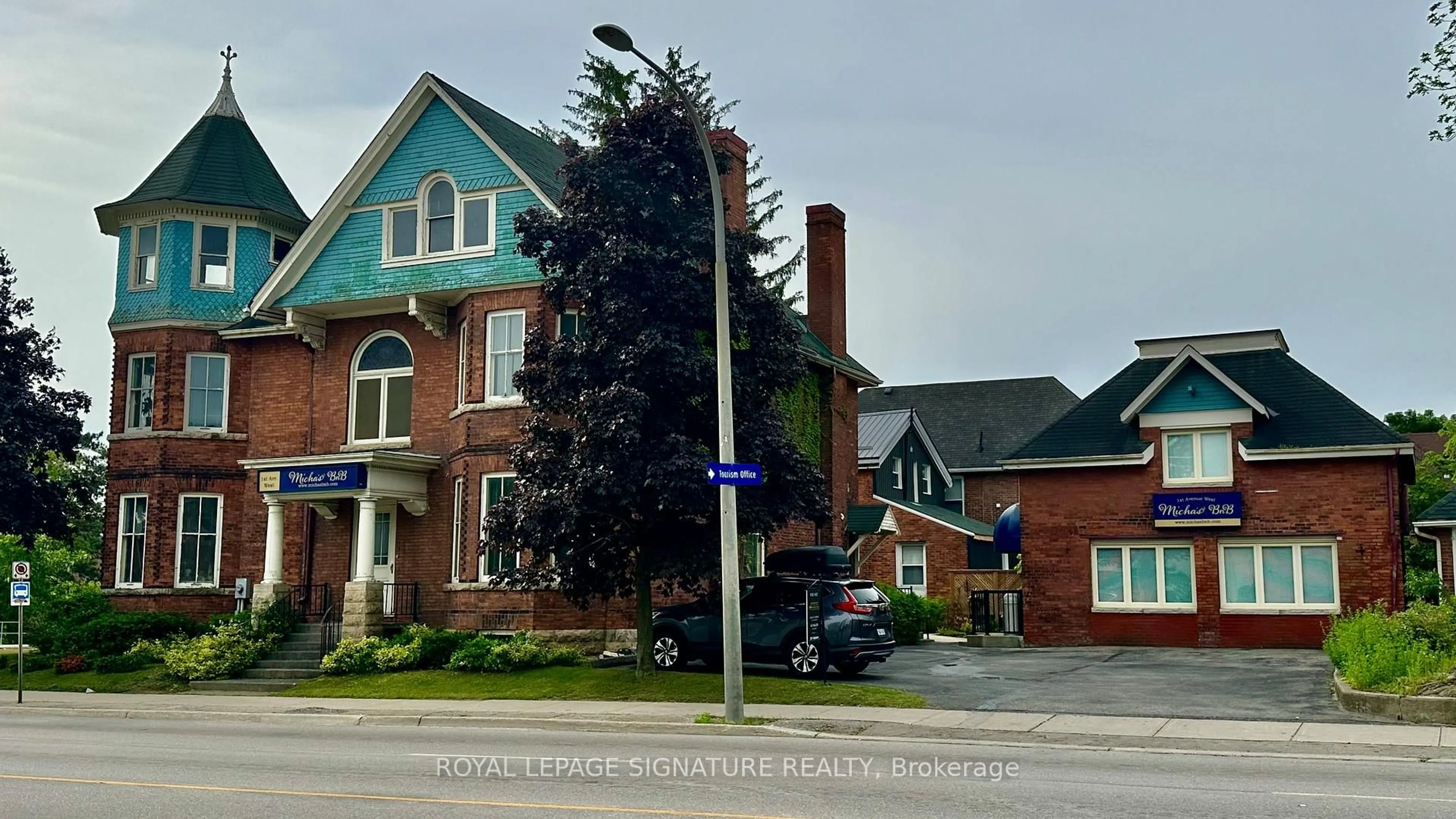Home with brick exterior material, street for 1000 1st Ave, Owen Sound Ontario N4K 4K5