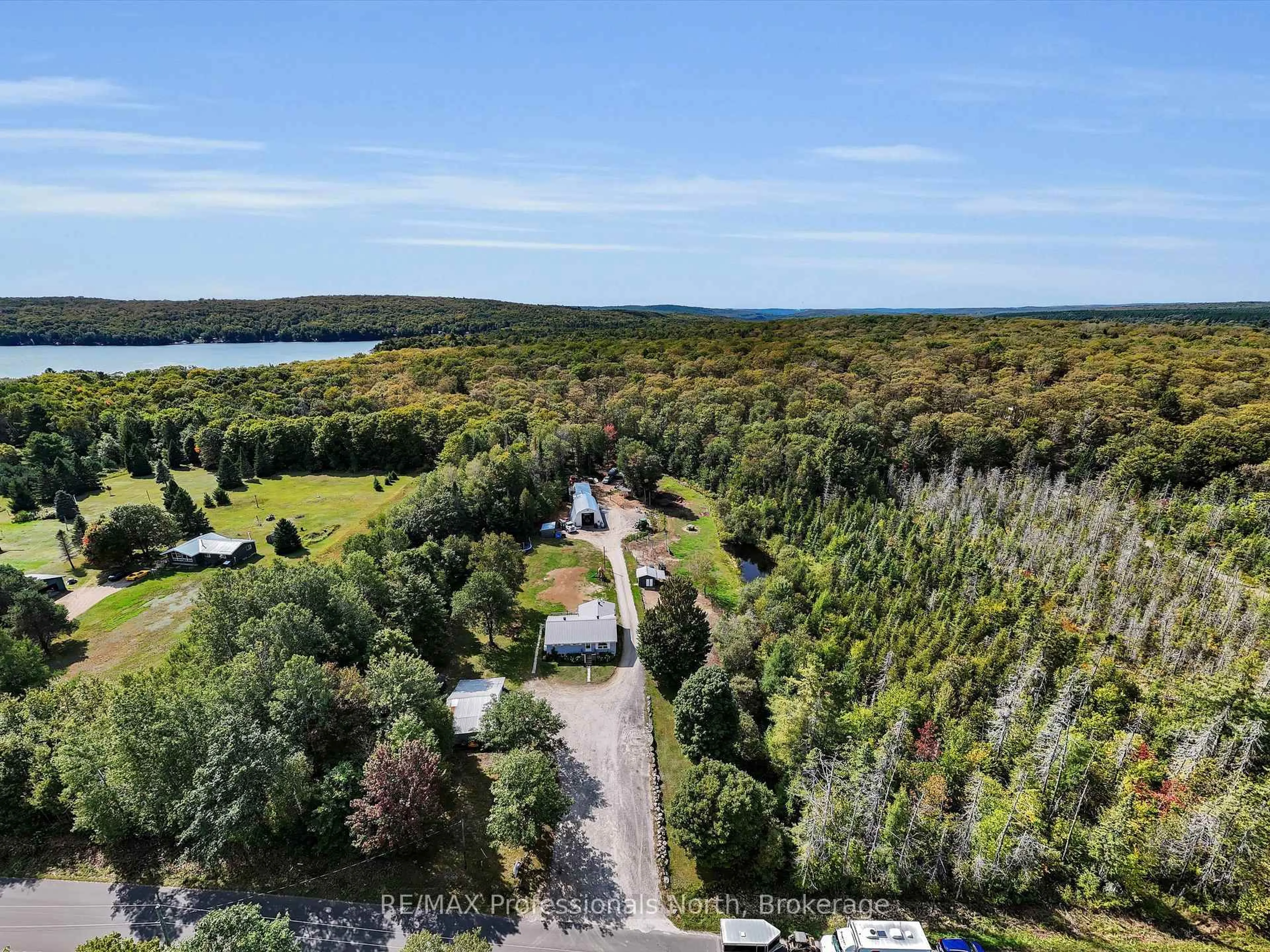 A pic from outside/outdoor area/front of a property/back of a property/a pic from drone, water/lake/river/ocean view for 1062 Skyline Dr, Armour Ontario P0A 1J0