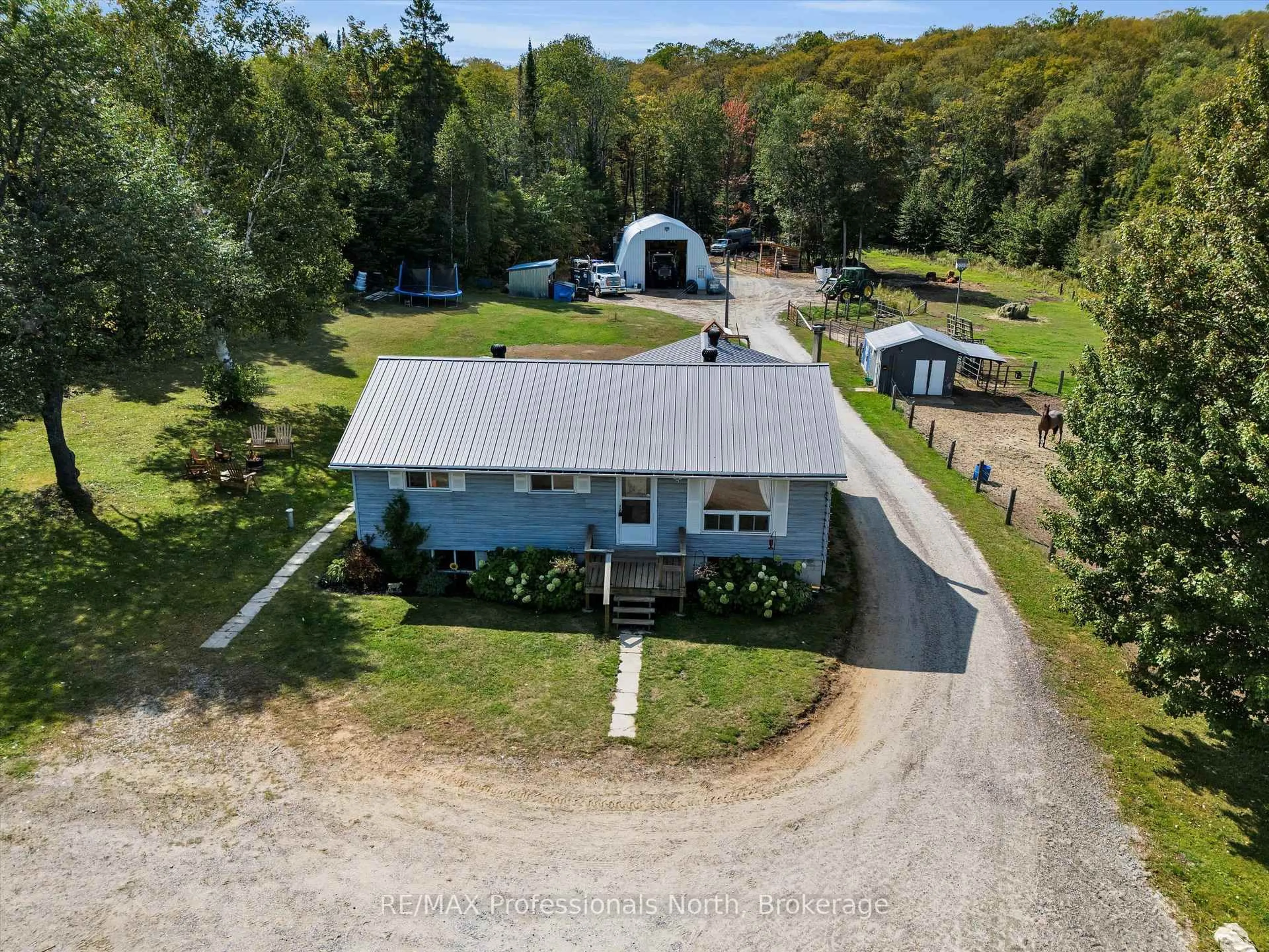 A pic from outside/outdoor area/front of a property/back of a property/a pic from drone, water/lake/river/ocean view for 1062 Skyline Dr, Armour Ontario P0A 1J0