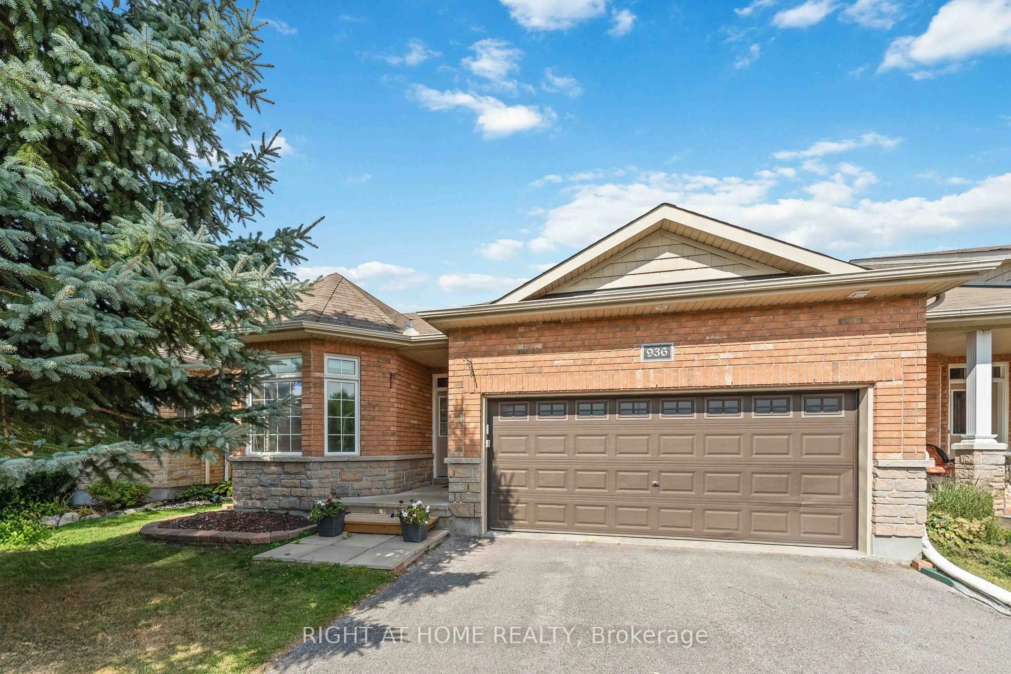 Home with brick exterior material, street for 936 Burwash Landing Bywy, Kanata Ontario K2W 0C8