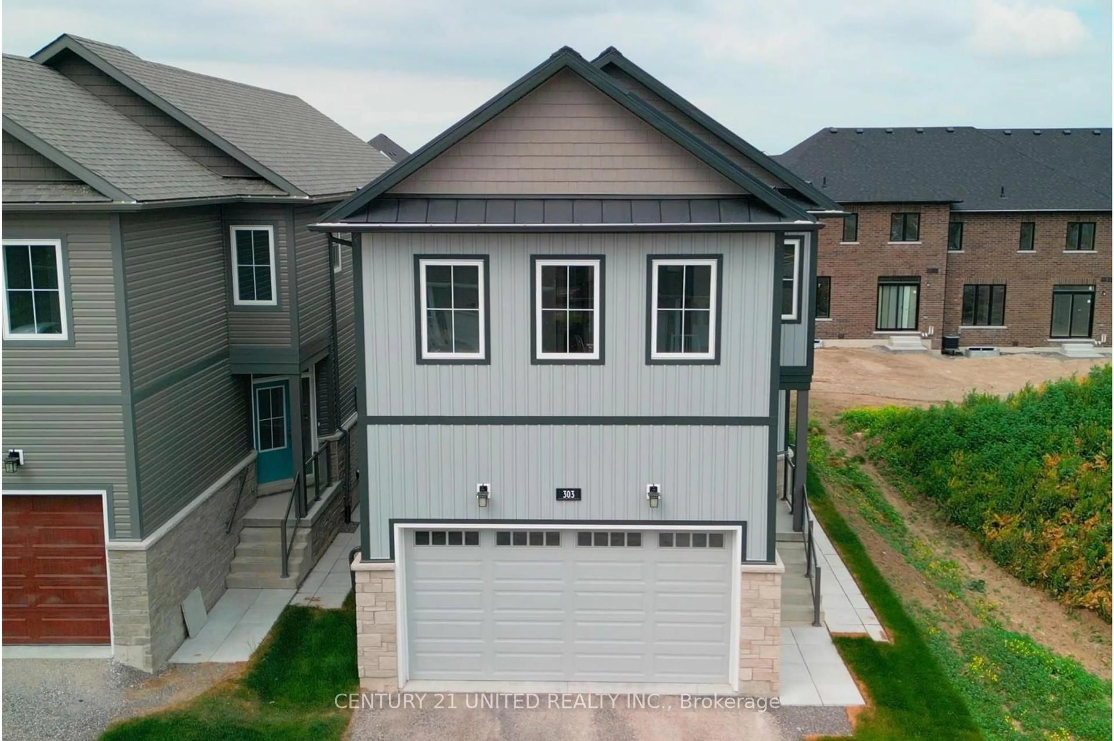 A pic from outside/outdoor area/front of a property/back of a property/a pic from drone, street for 303 Mullighan Gdns, Peterborough Ontario K0K 0G3