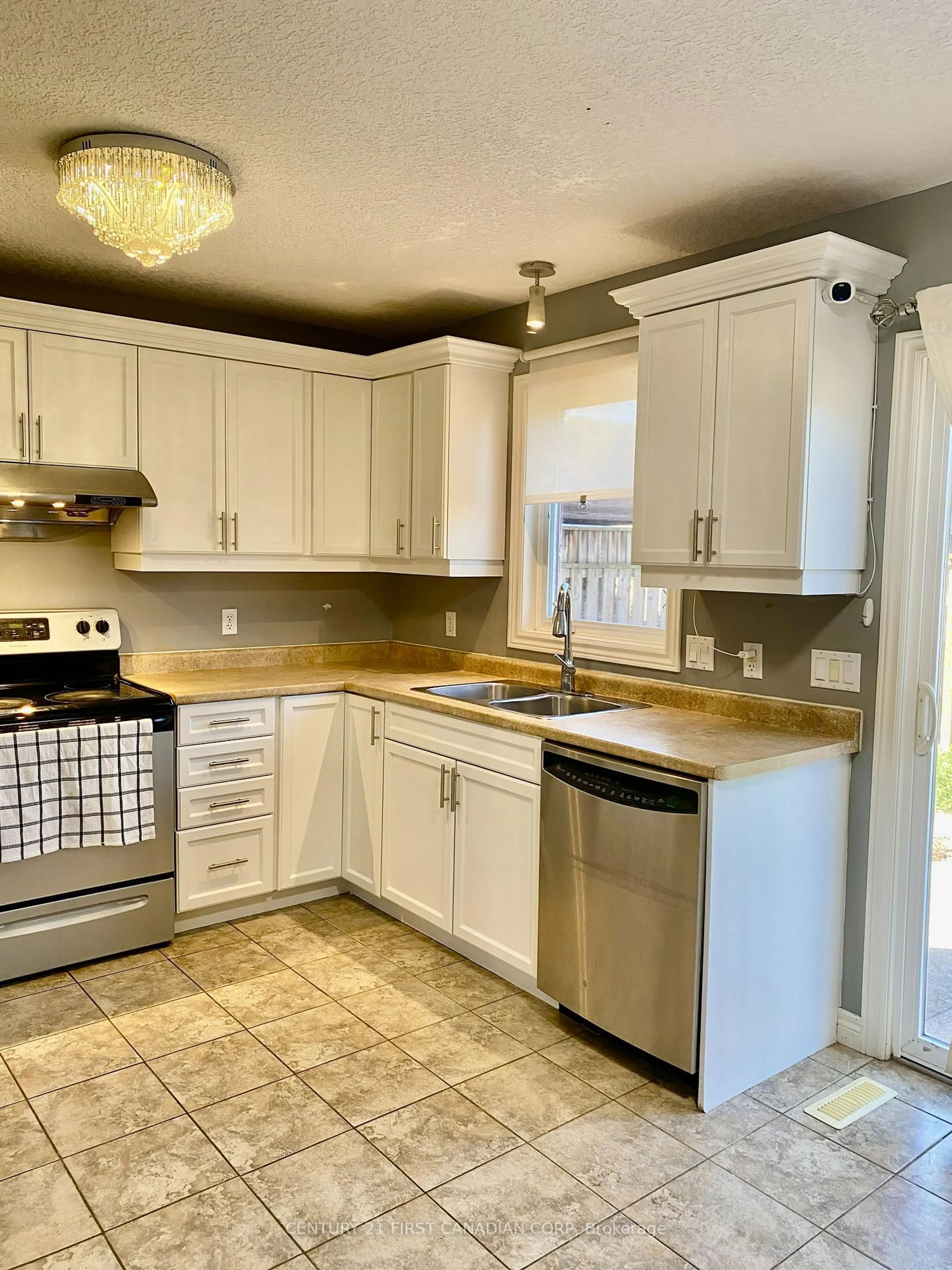 Open concept kitchen, ceramic/tile floor for 1678 BLACKMAPLE Cres, London East Ontario N5Y 6L6