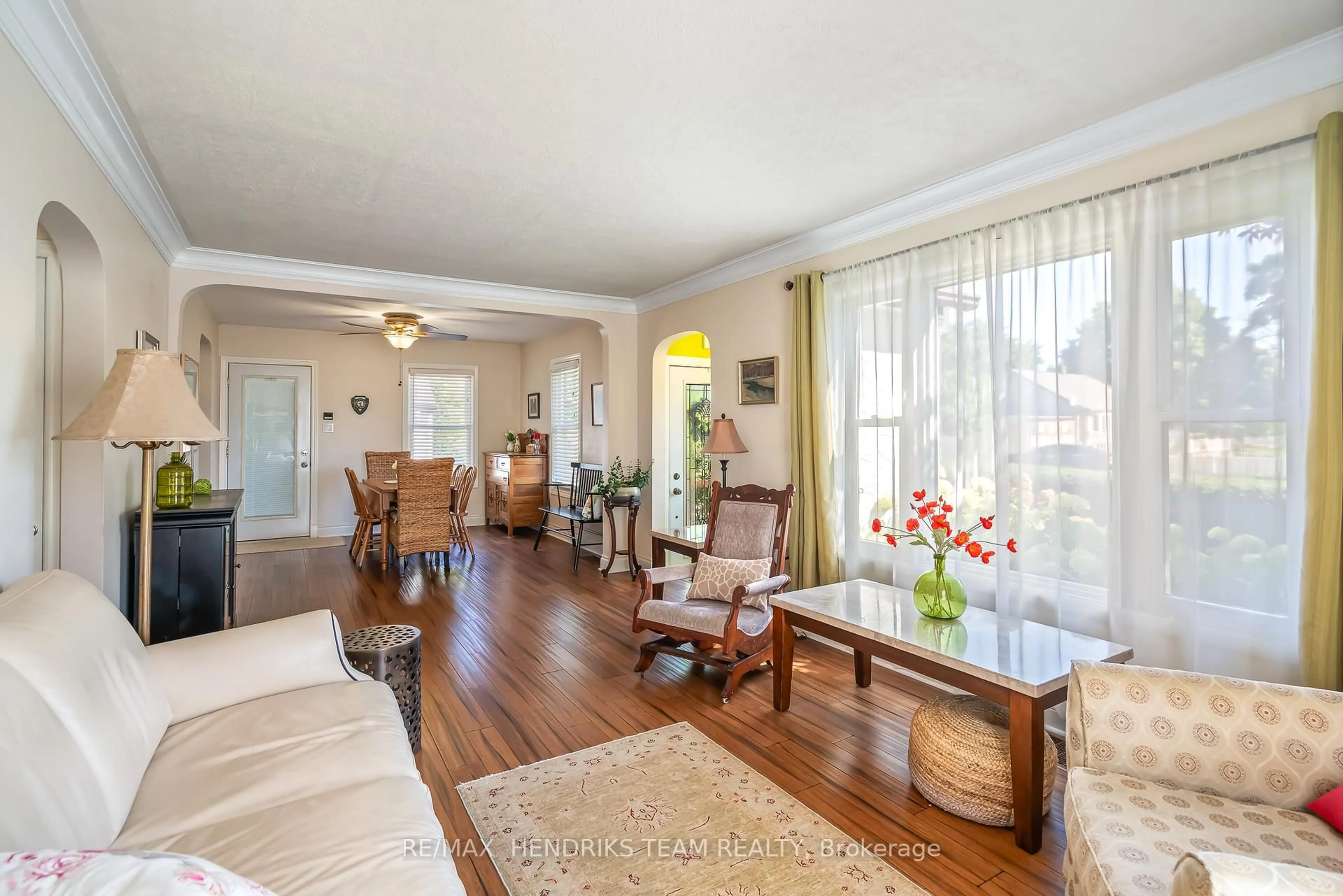 Living room with furniture, wood/laminate floor for 1 Walker Ave, St. Catharines Ontario L2N 3L5