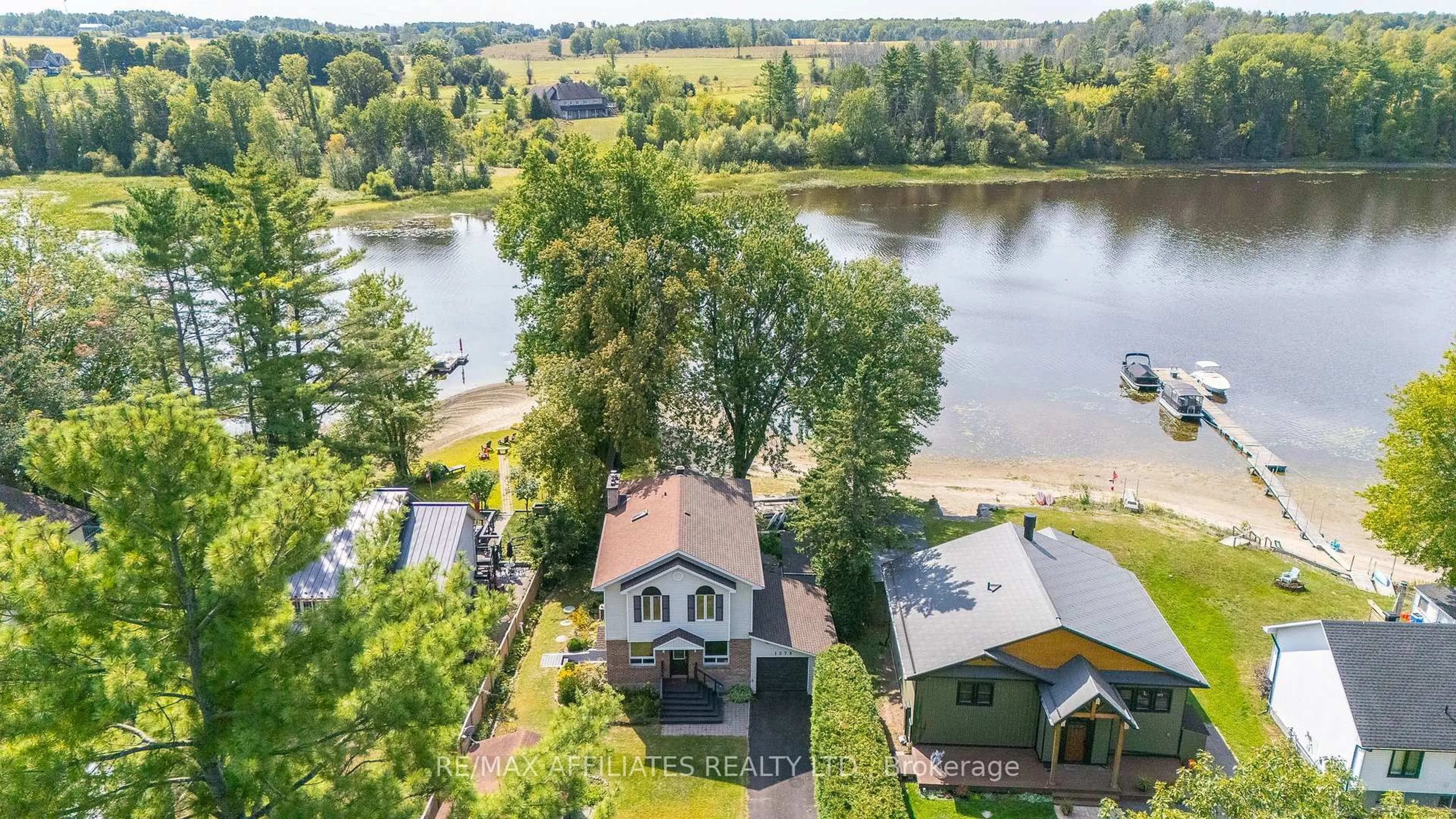 A pic from outside/outdoor area/front of a property/back of a property/a pic from drone, water/lake/river/ocean view for 1278 Bayview Dr, Ottawa Ontario K0A 3M0