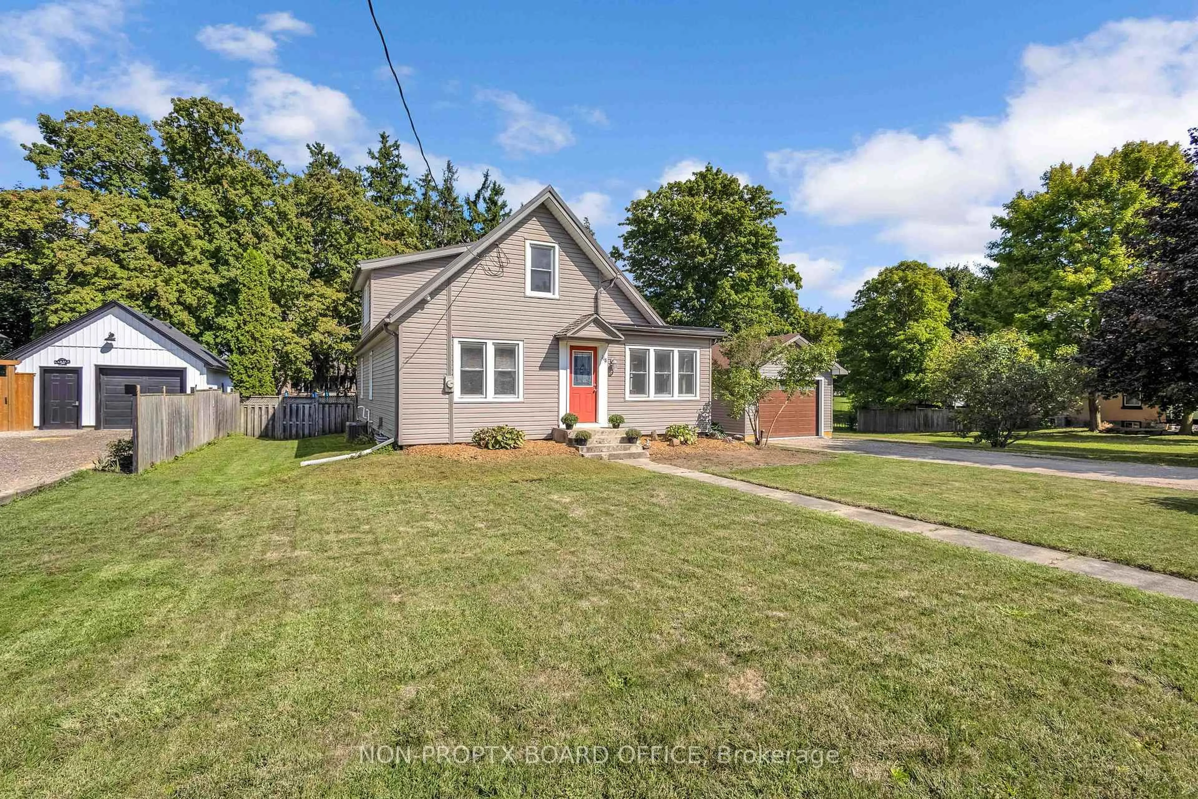 A pic from outside/outdoor area/front of a property/back of a property/a pic from drone, street for 118 Main St, Norwich Ontario N0J 1P0